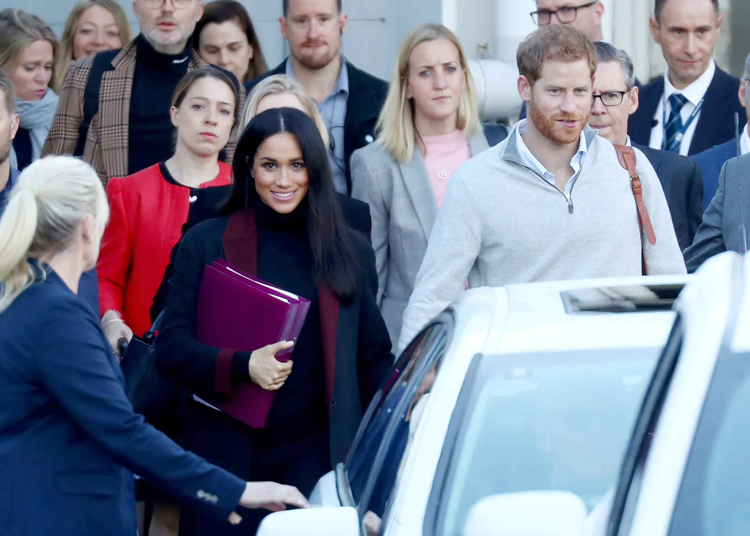 OCTOBER 15, 2018: SYDNEY, NSW - (EUROPE AND AUSTRALASIA OUT) Prince Harry, Duke of Sussex and Meghan, Duchess of Sussex arrive into Sydney International Airport in Sydney, New South Wales. Prince Harry and Meghan Markle are in Sydney ahead of the Invictus Games. (Photo by Hollie Adams/Newspix/Getty Images)