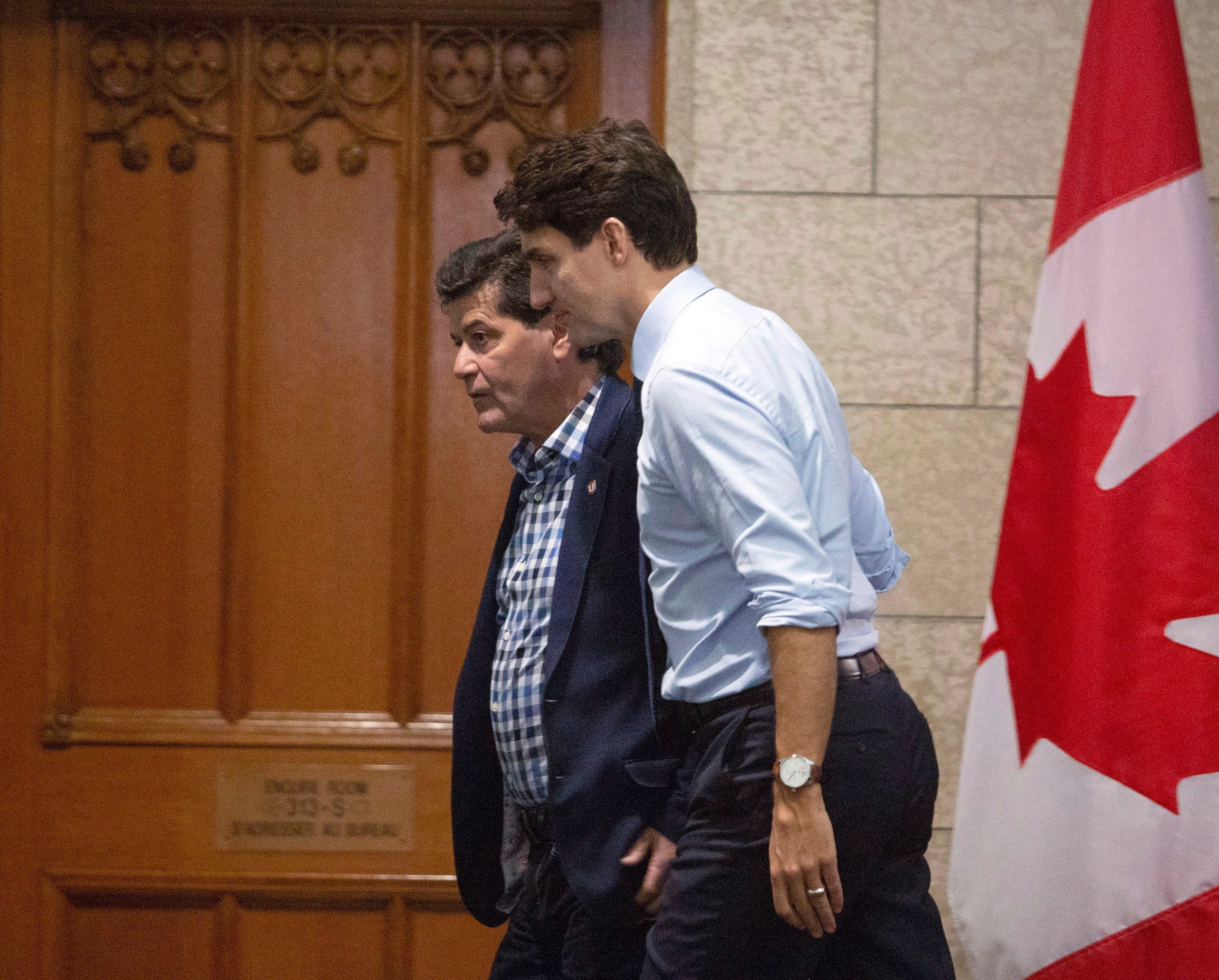 Prime Minister Justin Trudeau and Unifor National President Jerry Dias make their way to a meeting on Parliament Hill in Ottawa on Tuesday, Nov. 27, 2018 (THE CANADIAN PRESS/Fred Chartrand)