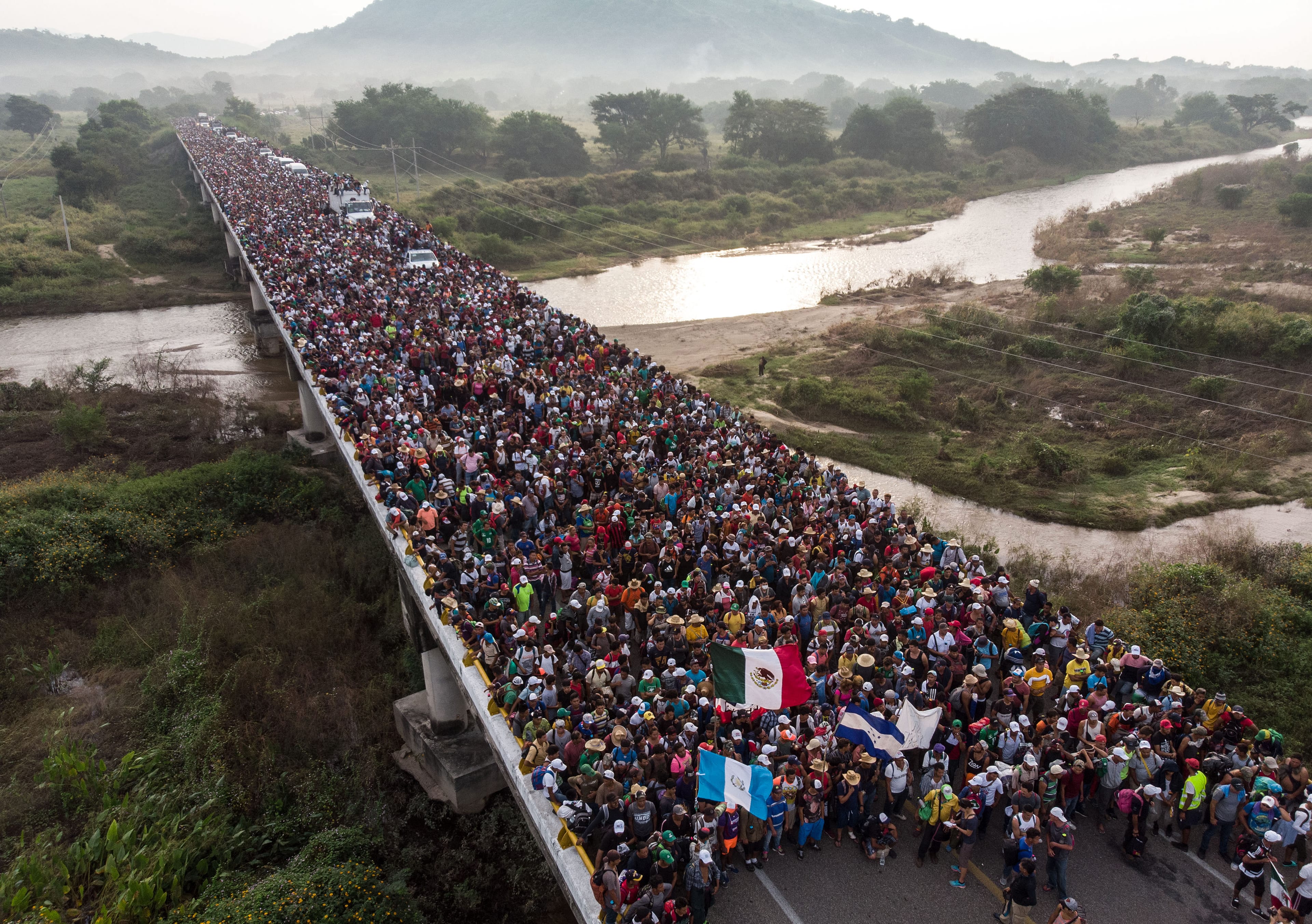 Aerial view of migrants heading in a caravan to the U.S., as they leave Arriaga on their way to San Pedro, Tapanatepec, in southern Mexico on Oct. 27, 2018. (Guillermo Arias/AFP/Getty Images)