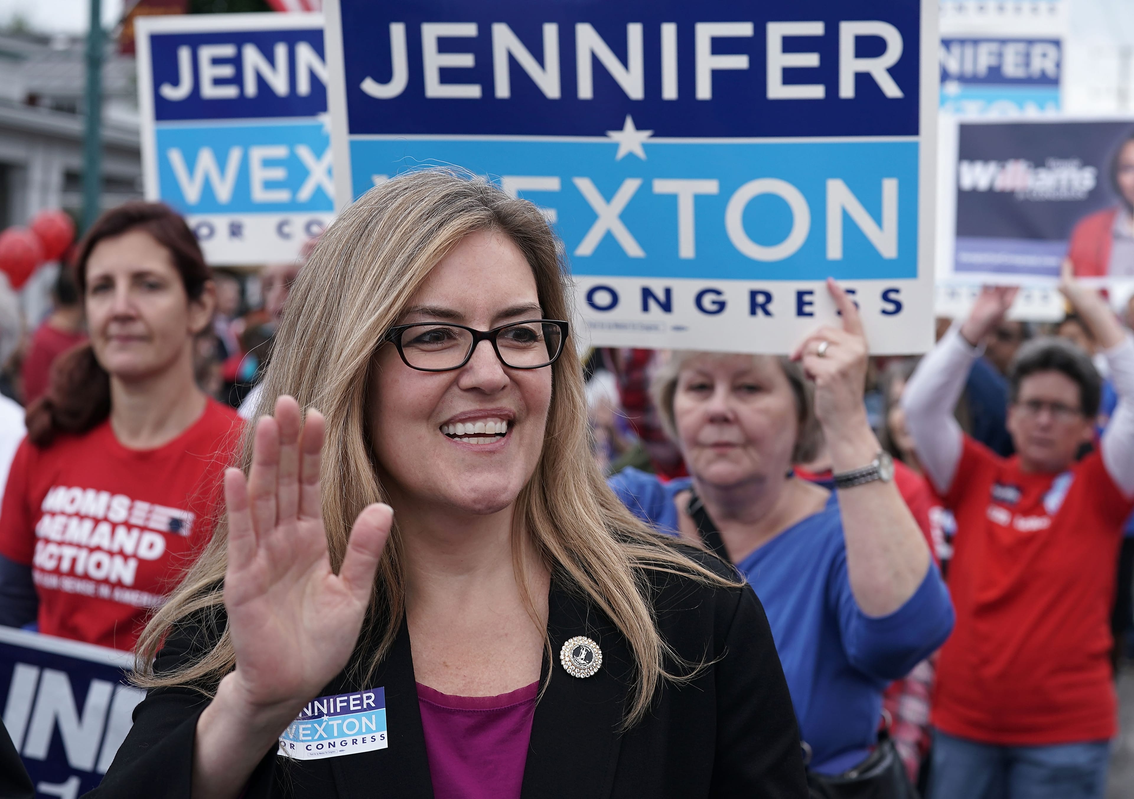 Democratic U.S. House candidate and Virginia State Sen. Jennifer Wexton waves to constituents during a parade on Oct. 20, 2018 in Haymarket, Virginia. (Alex Wong/Getty Images)