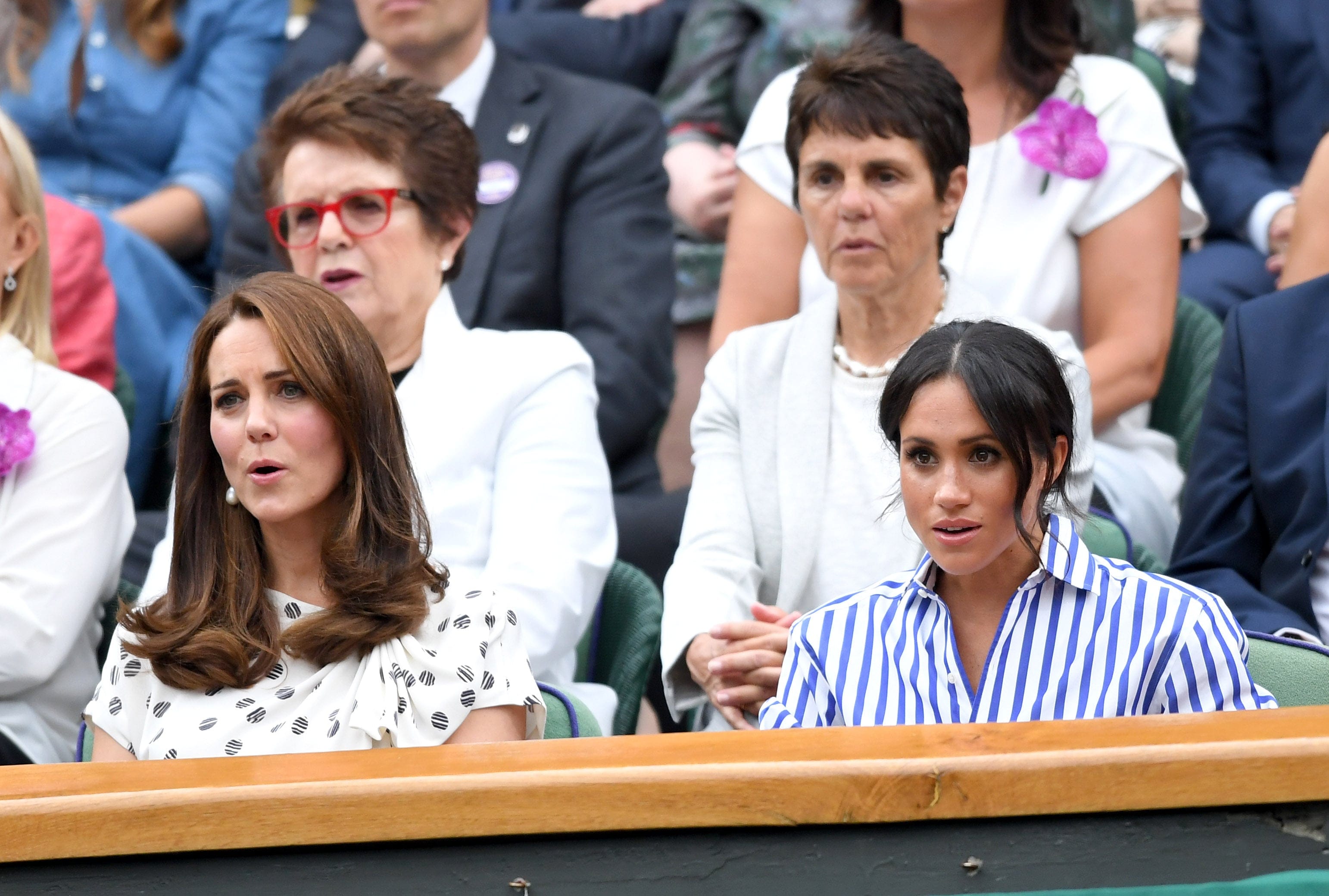 LONDON, ENGLAND - JULY 14: Catherine, Duchess of Cambridge and Meghan, Duchess of Sussex attend day twelve of the Wimbledon Tennis Championships at the All England Lawn Tennis and Croquet Club on July 14, 2018 in London, England. (Photo by Karwai Tang/WireImage )
