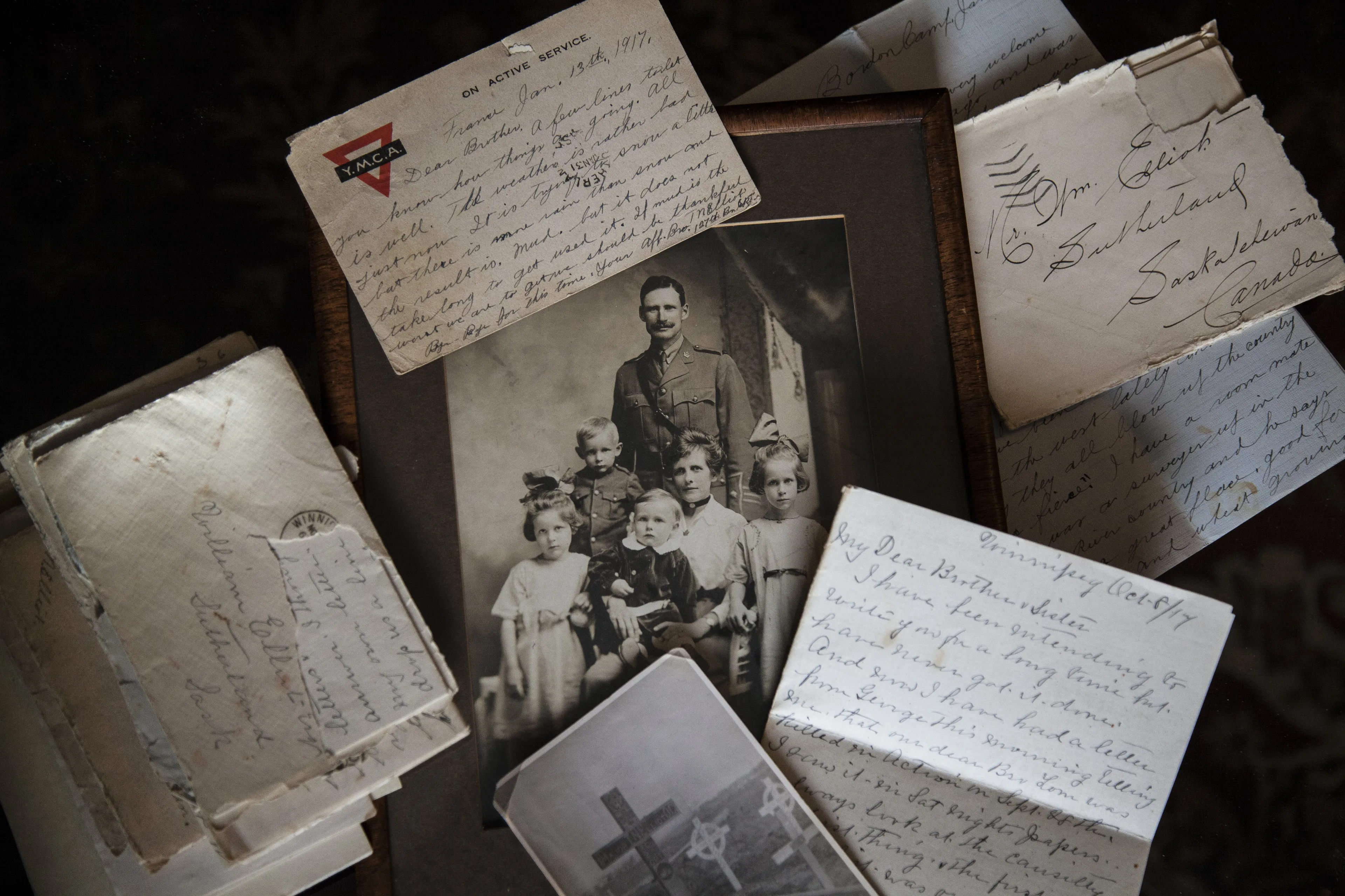 Letters from Thomas Ninian Elliot to his family with photographs of family and the original grave in Belgium. (Elisa Elliot)