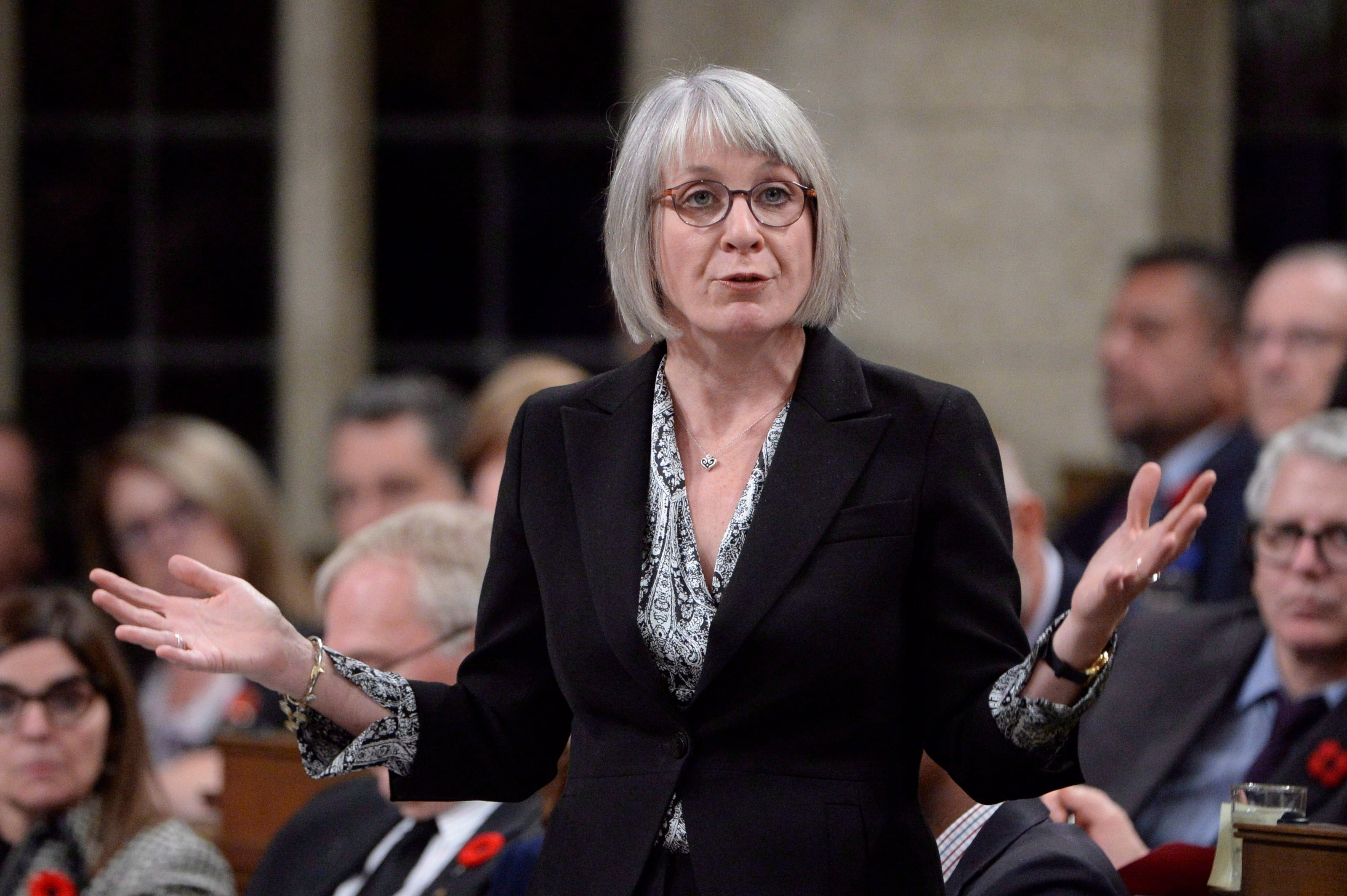 Labour Minister Patty Hajdu rises during question period in the House of Commons on Parliament Hill in Ottawa on Tuesday, Oct. 30, 2018. (THE CANADIAN PRESS/Adrian Wyld)