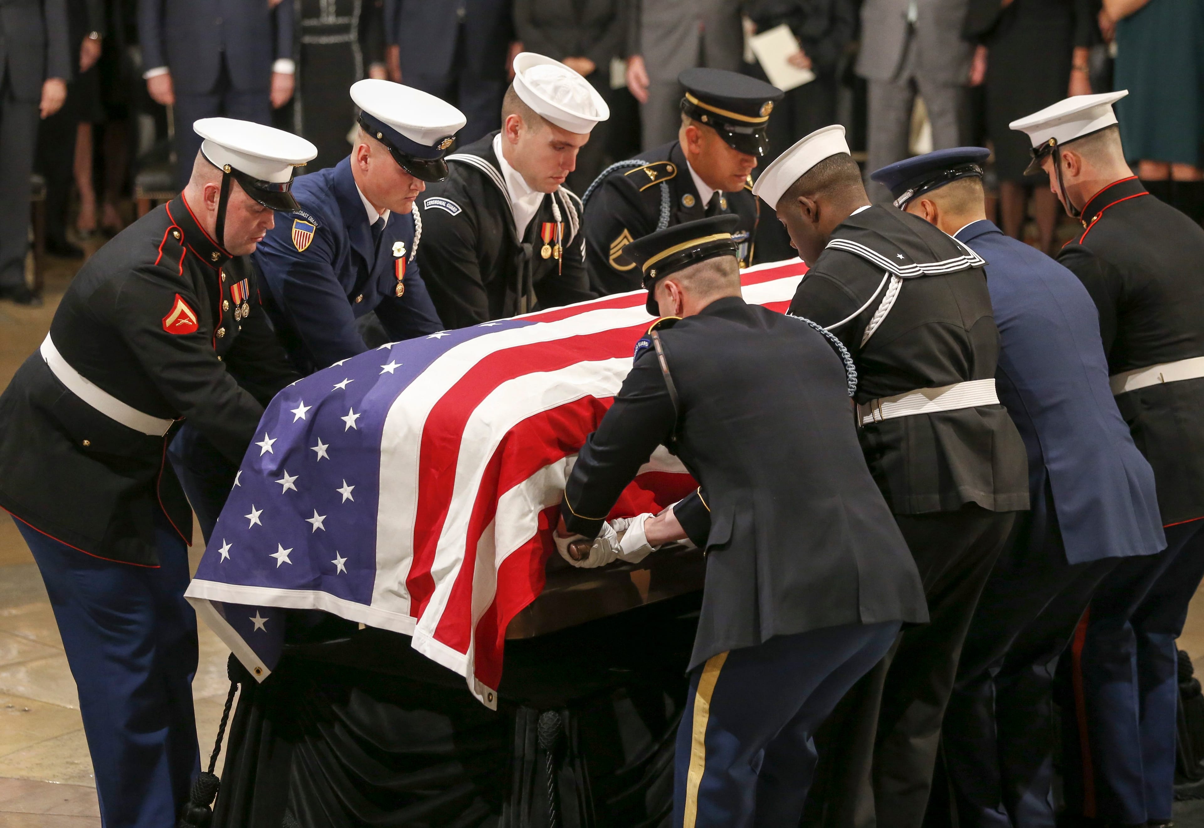 The casket bearing the body of former U.S. President George H.W. Bush is carried into the Rotunda of the U.S. Capitol in Washington EPA/MICHAEL REYNOLDS