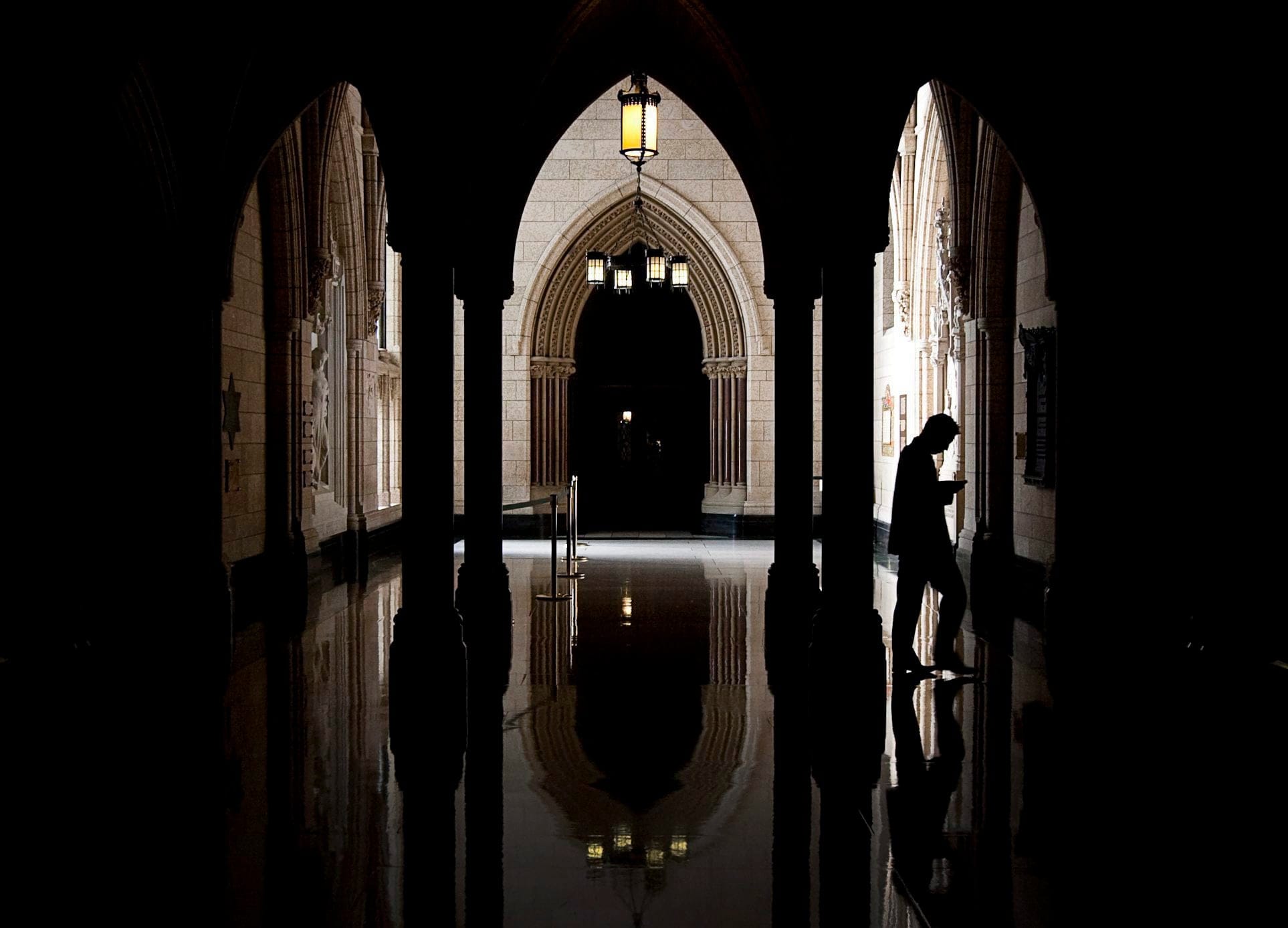 A person walks through the halls of the centre block on Parliament Hill in Ottawa on Wednesday Sept. 22, 2010. (THE CANADIAN PRESS/Sean Kilpatrick)