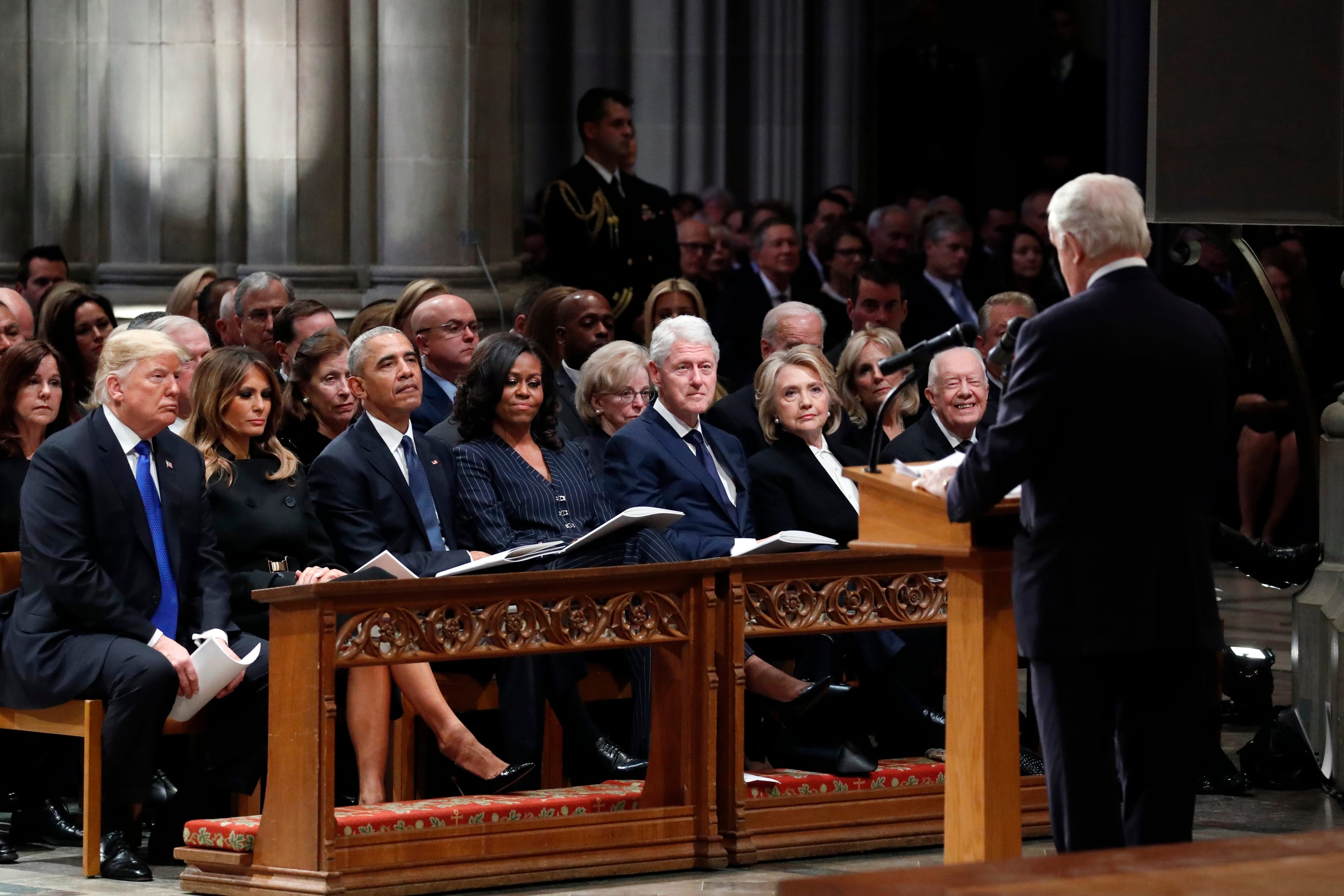 From left, President Donald Trump, first lady Melania Trump, former President Barack Obama, Michelle Obama, former President Bill Clinton, former Secretary of State Hillary Clinton, and former President Jimmy Carter listen as former Canadian Prime Minister Brian Mulroney speaks during a state funeral for former U.S. President George H. W. Bush at the Washington National Cathedral on December 5, 2018 in Washington, DC. President Bush will be buried at his final resting place at the George H.W. Bush Presidential Library at Texas A&M University in College Station, Texas. A WWII combat veteran, Bush served as a member of Congress from Texas, ambassador to the United Nations, director of the CIA, vice president and 41st president of the United States. (Alex Brandon/Getty Images)