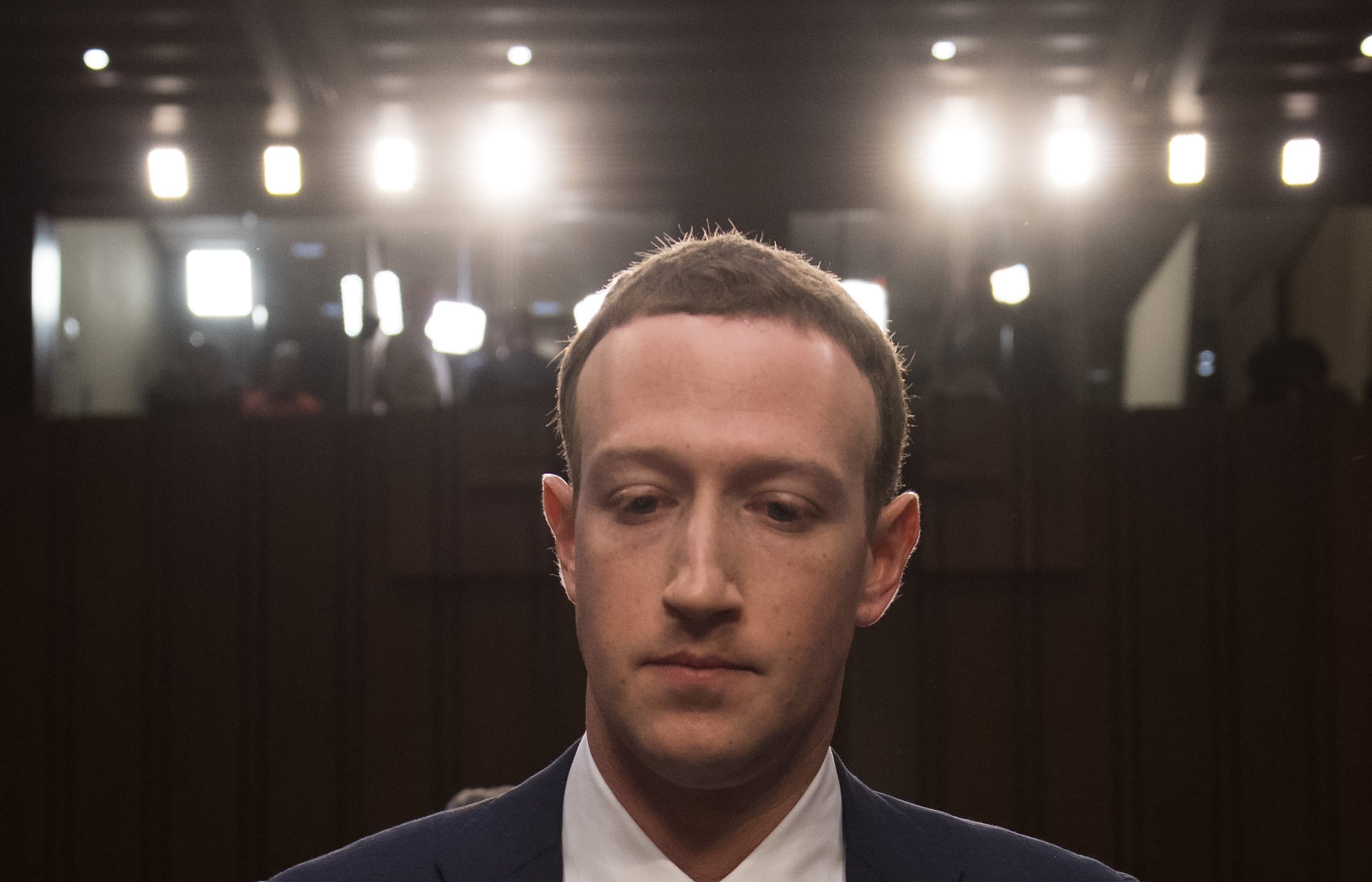 Facebook founder and CEO Mark Zuckerberg arrives to testify following a break during a Senate Commerce, Science and Transportation Committee and Senate Judiciary Committee joint hearing about Facebook on Capitol Hill in Washington, DC, April 10, 2018. / AFP PHOTO / SAUL LOEB (Photo credit should read SAUL LOEB/AFP/Getty Images)