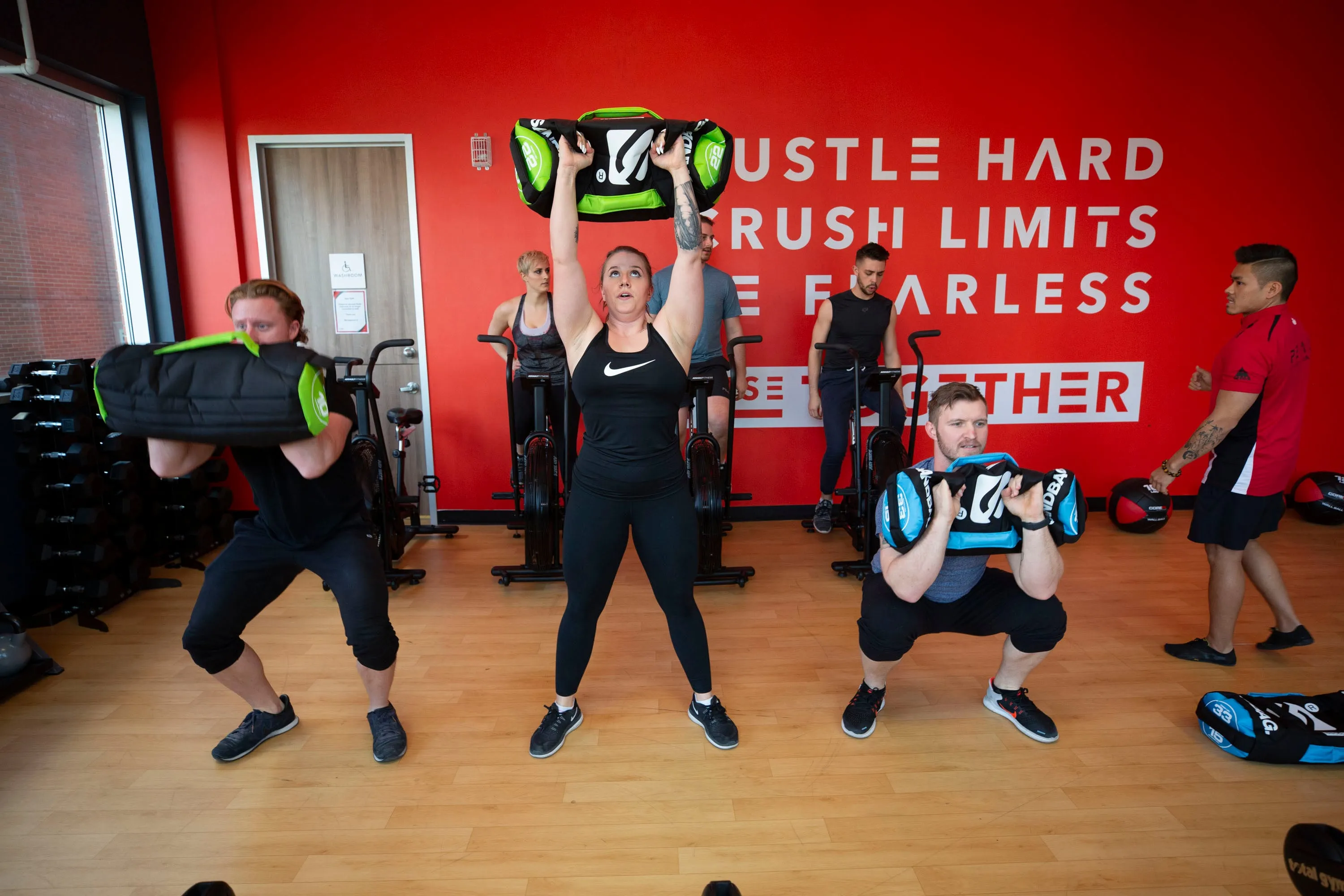 Instructors do a high intensity workout at GoodLife Fitness in Calgary, Alta., Dec. 18, 2018. (Todd Korol)