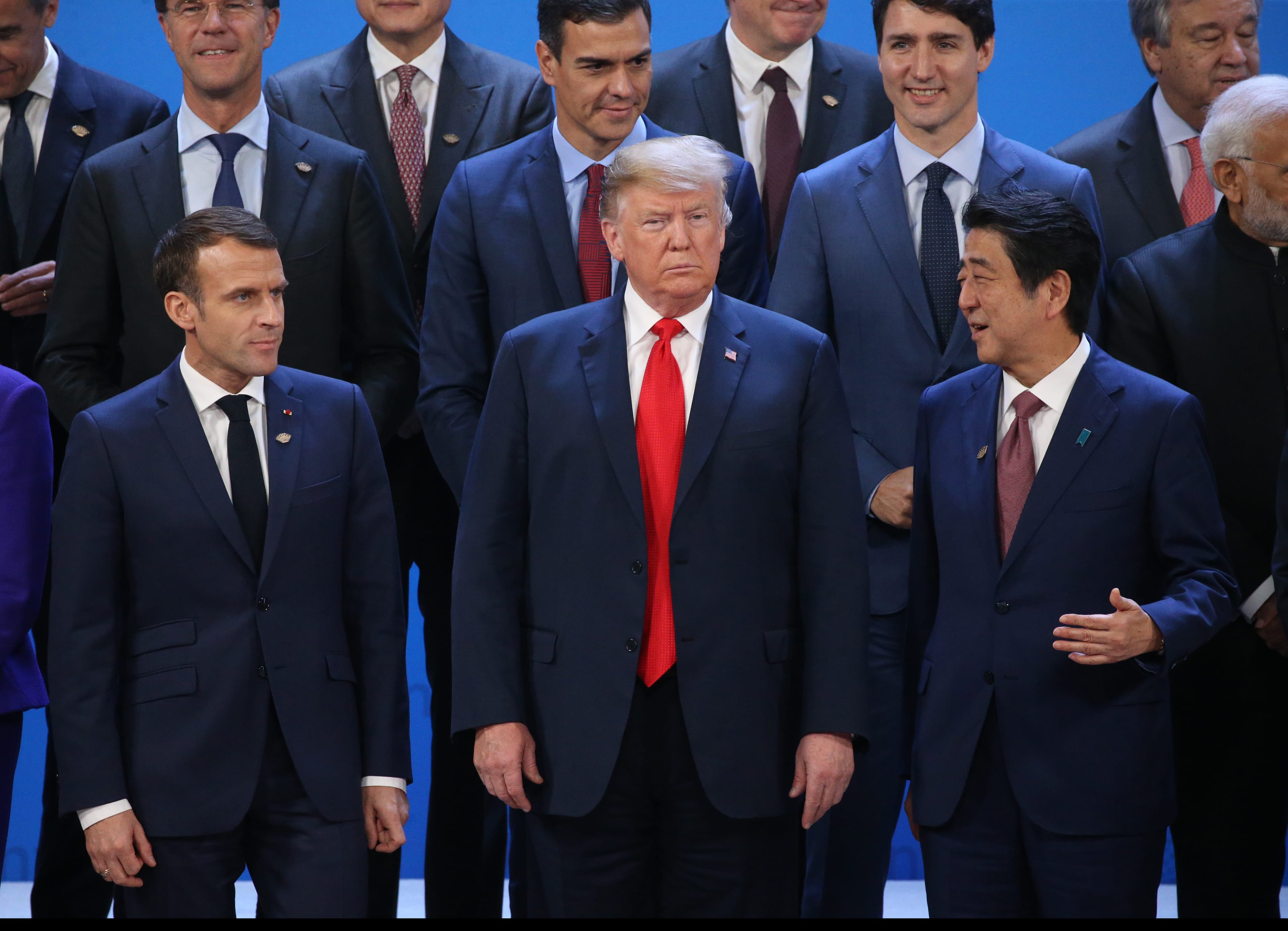 French President Emmanuel Macron, U.S. President Donald Trump and Japanese President Shinzo Abe gather with other world leaders at the G20 Summit on Nov. 30, 2018, in Buenos Aires, Argentina. (Mikhail Svetlov/Getty Images)
