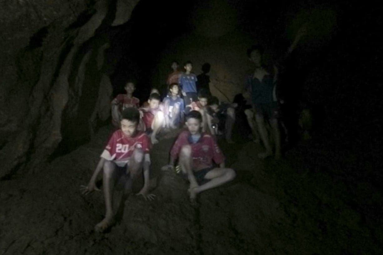 This photo provided by the Thai Navy SEALs shows the trapped teens in the cave in northern Thailand, on July 2, 2018. (Xinhua News Agency/eyevine/Redux Pictures)