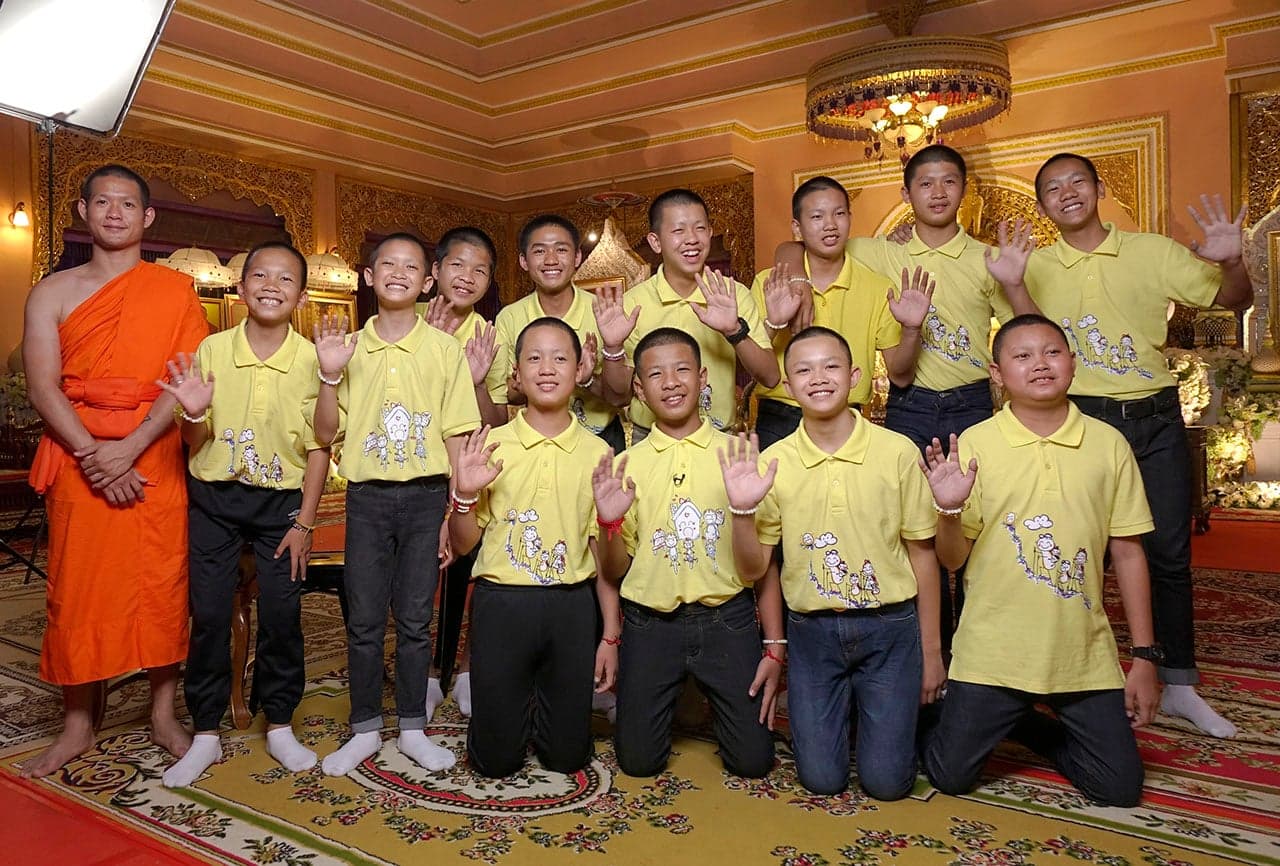 The Thai soccer team and their assistant coach are pictured after their miraculous cave rescue. (Pannawat Muangmoon/ABC/Getty Images)