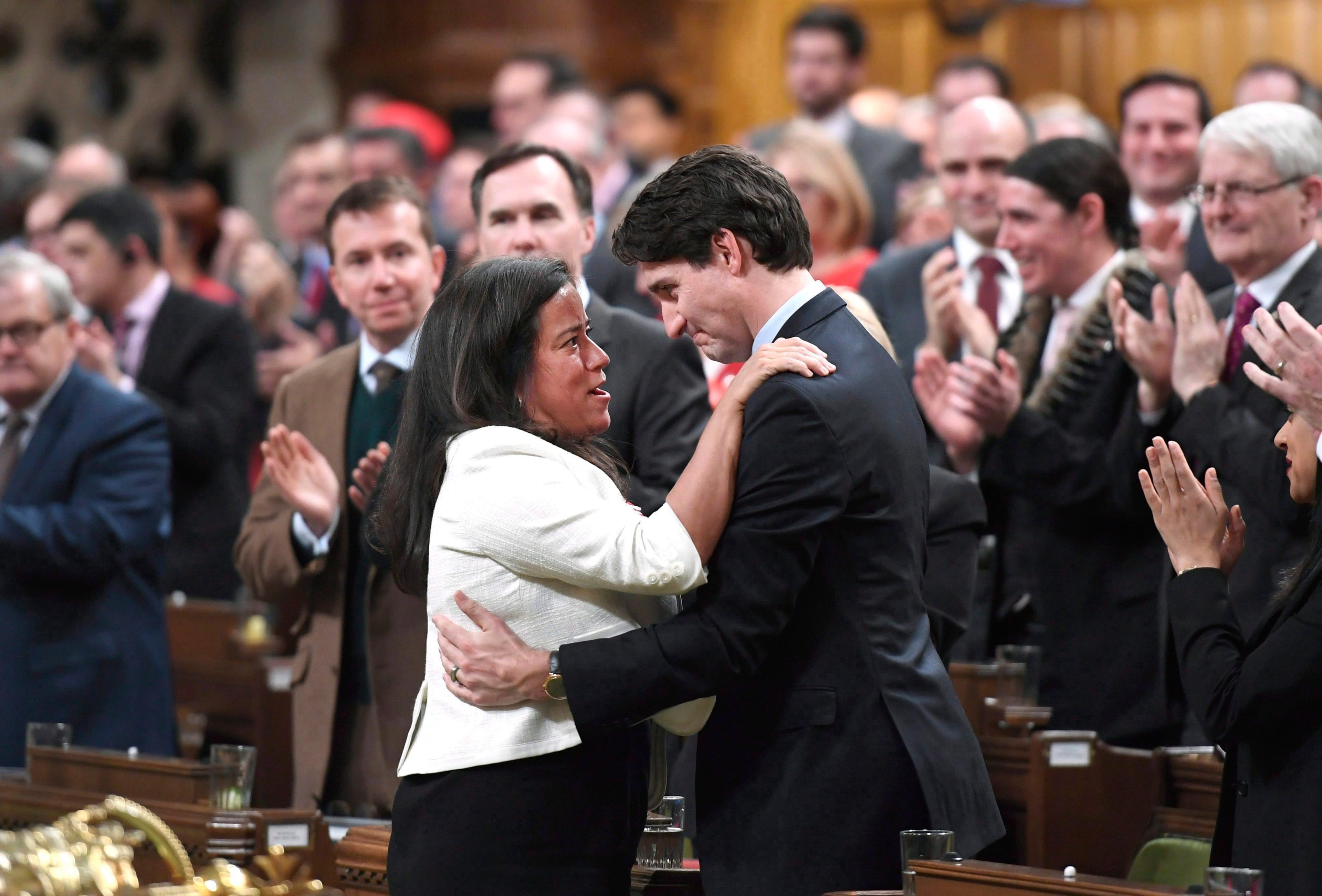 Trudeau is embraced by Wilson-Raybould after delivering a speech on the recognition and implementation of Indigenous rights on Parliament Hill in Ottawa on Wednesday, Feb. 14, 2018. (Justin Tang/CP)