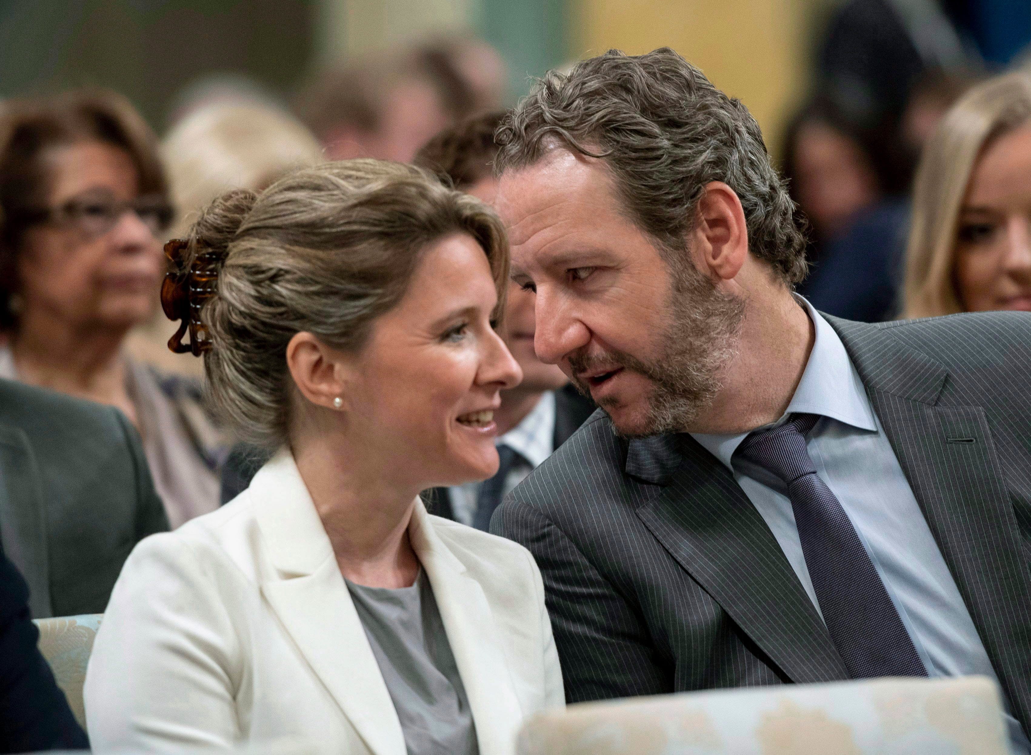 Butts speaks with Katie Telford, chief of staff to the Prime Minister, before a swearing in ceremony at Rideau Hall in Ottawa on Wednesday, July 18, 2018. (Justin Tang/CP)