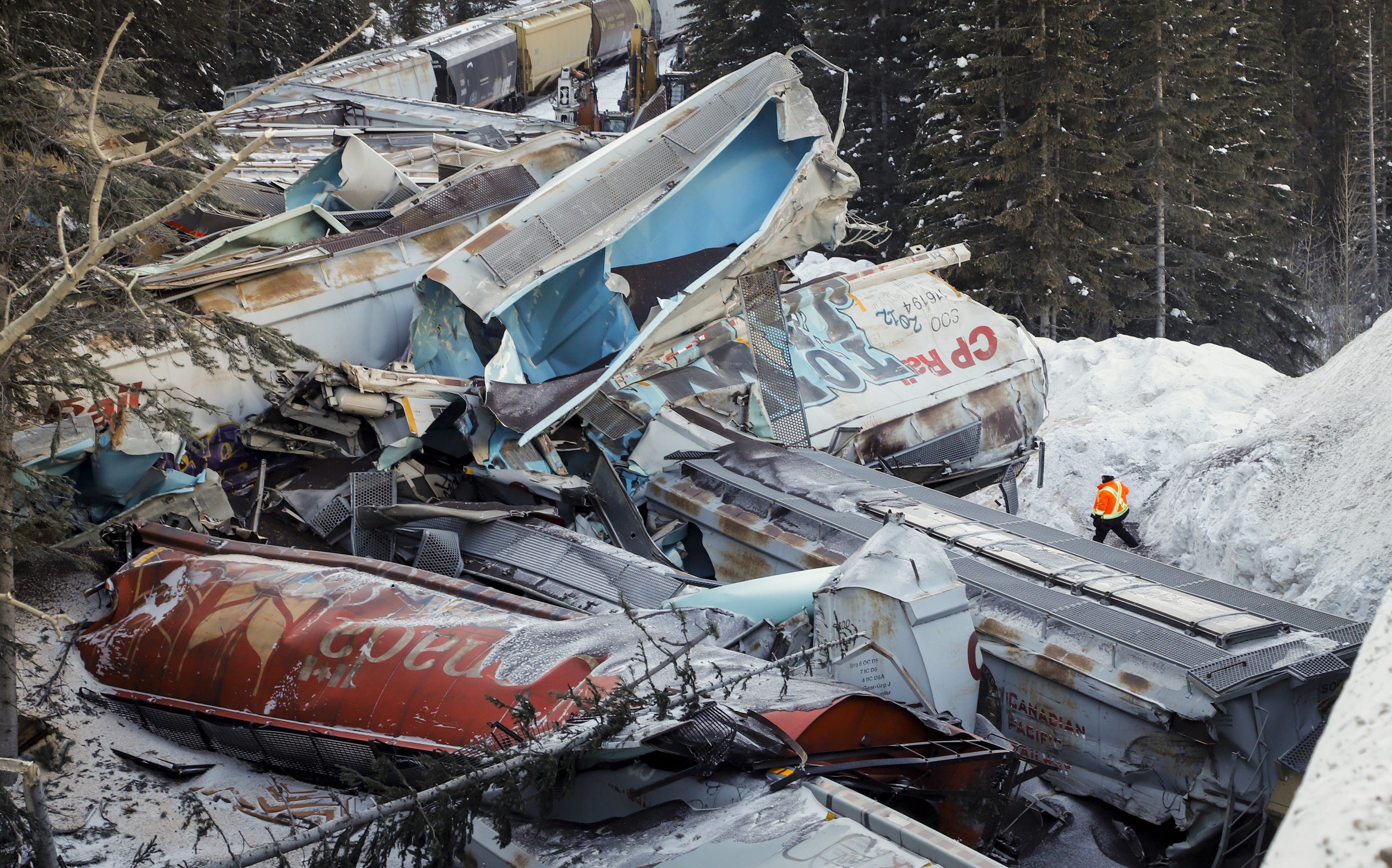 The scene of a derailment near Field, B.C. that killed three crew members. The Canadian Pacific freight train reportedly fell more than 60 metres from a bridge near the Alberta-B.C. boundary (Jeff McIntosh/CP)