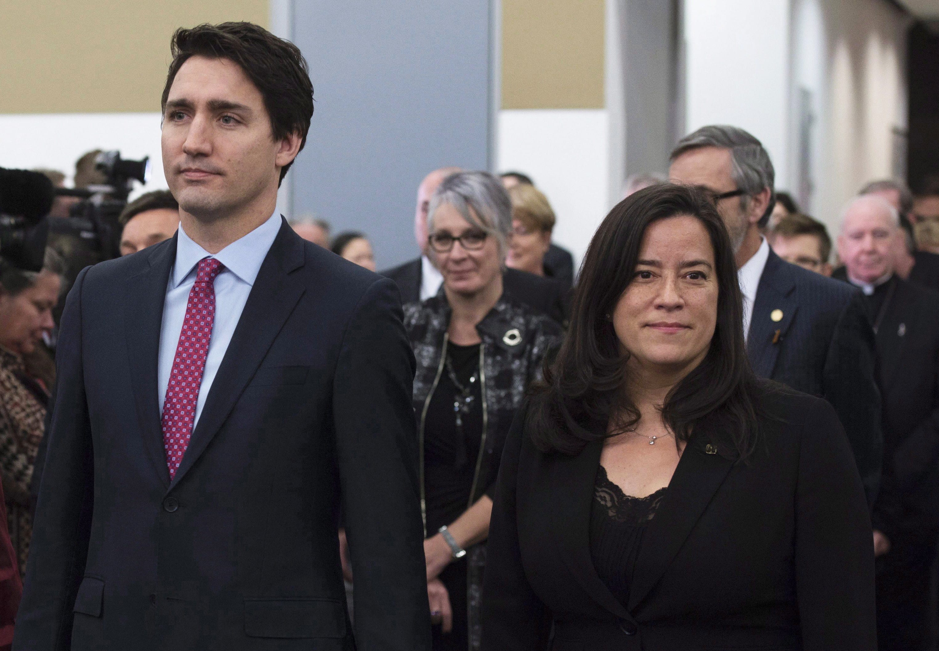 Prime Minister Justin Trudeau and former minister of justice and Attorney General of Canada Jody Wilson-Raybould take part in the grand entrance as the final report of the Truth and Reconciliation commission is released, Tuesday Dec. 15, 2015 in Ottawa. (THE CANADIAN PRESS/Adrian Wyld)
