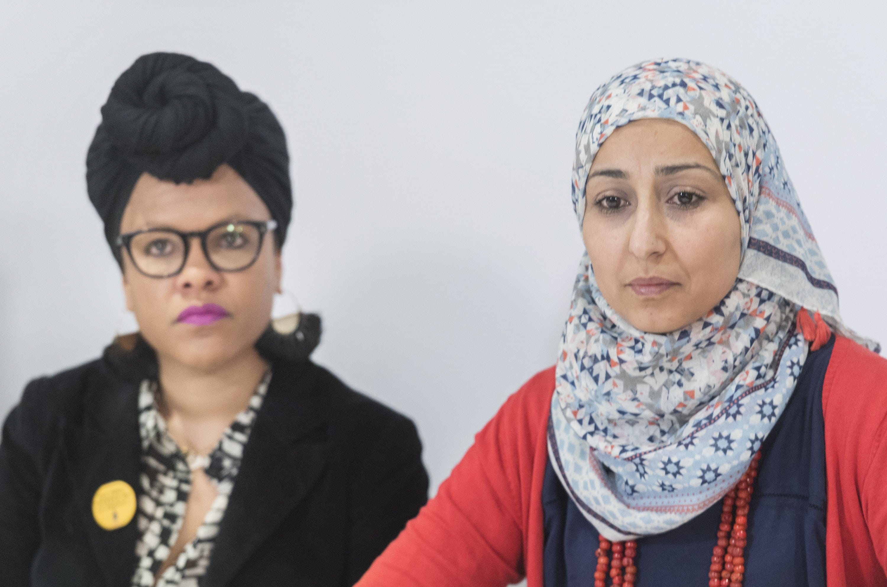 Marlihan Lopez and Safa Chebbi, who are part of a coalition to mobilize Quebecers against discriminatory legislation, speak during a news conference opposing Bill 21 in Montreal, March 29, 2019. (Graham Hughes/CP)