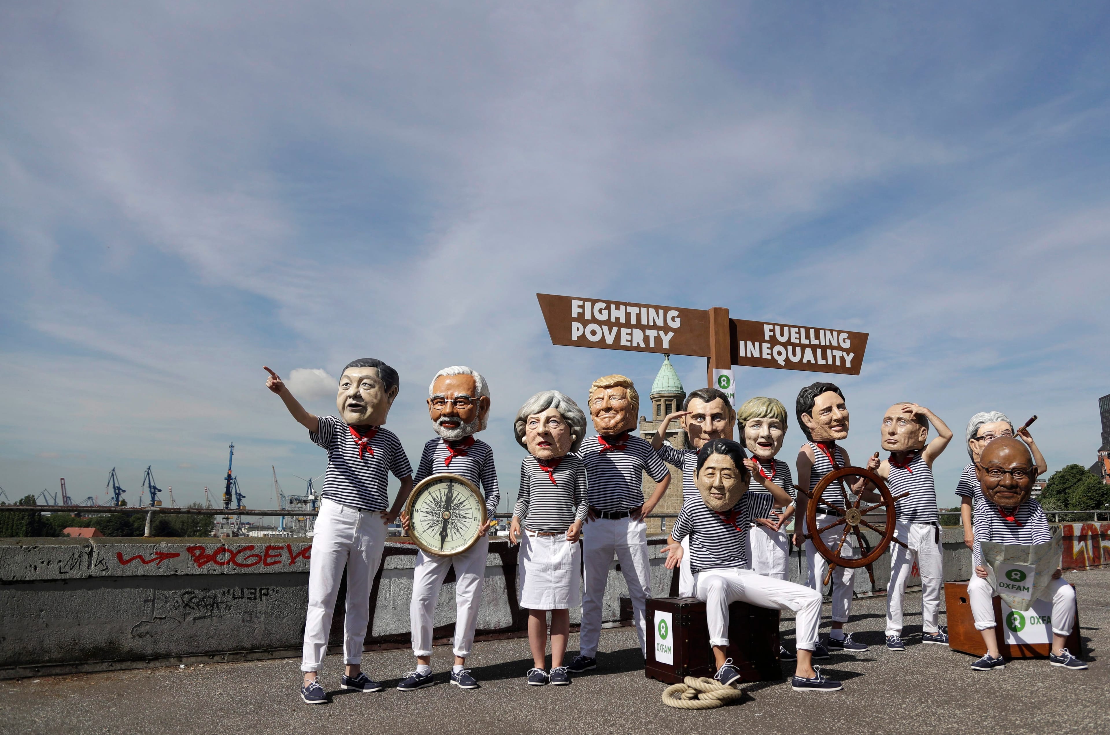 Oxfam stages a protest at the G-20 summit in Germany, on July 6, 2017. (AP Photo/Matthias Schrader)
