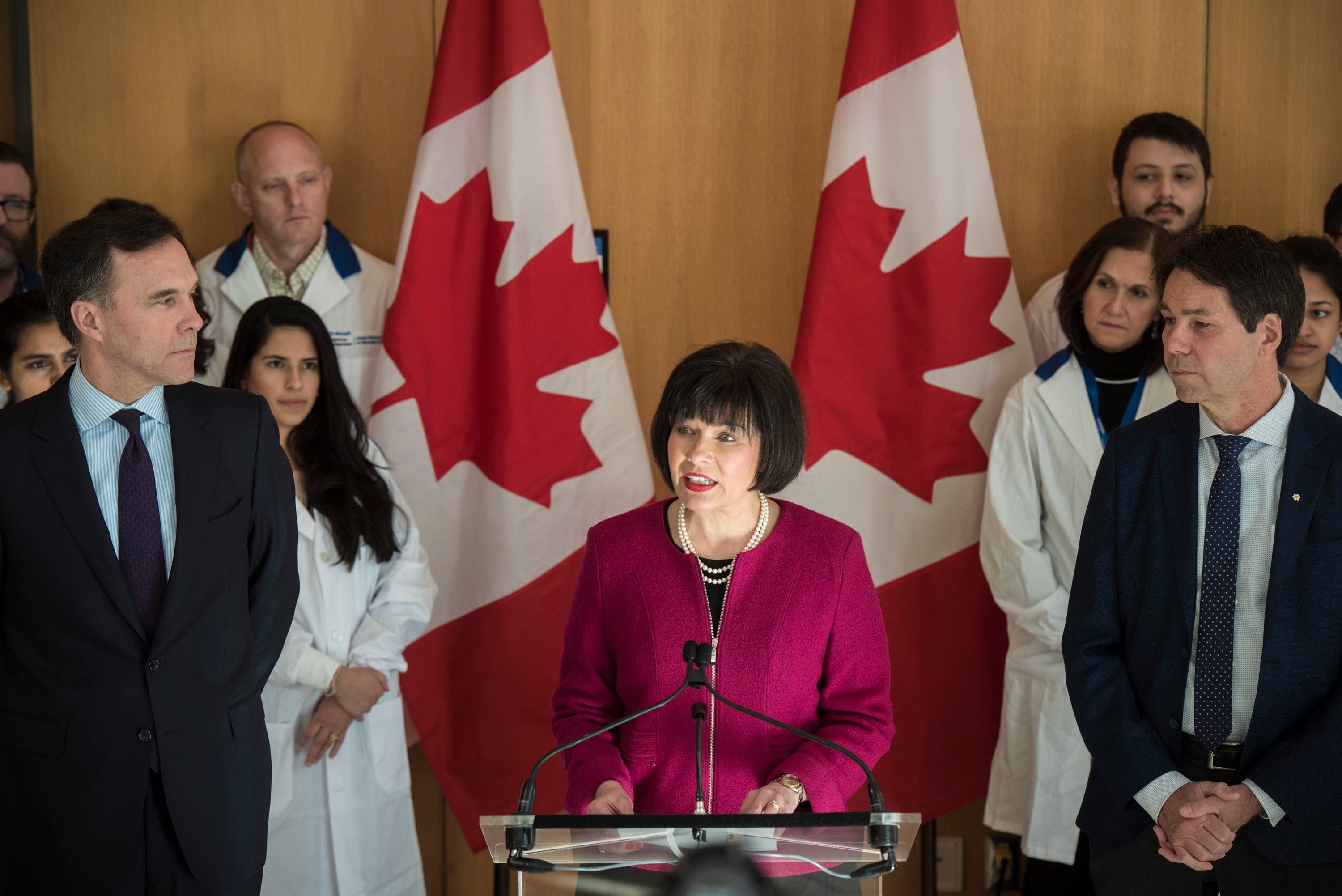 Bill Morneau, Minister of Finance, left to right, Ginette Petitpas Taylor, federal Minister of Health and Dr. Eric Hoskins, Chair of the Advisory Council on the Implementation of National Pharmacare, during a press conference on the national pharmacare program at the Li Ka Shing Knowledge Institute in Toronto on Wednesday, March 6, 2019. THE CANADIAN PRESS/ Tijana Martin