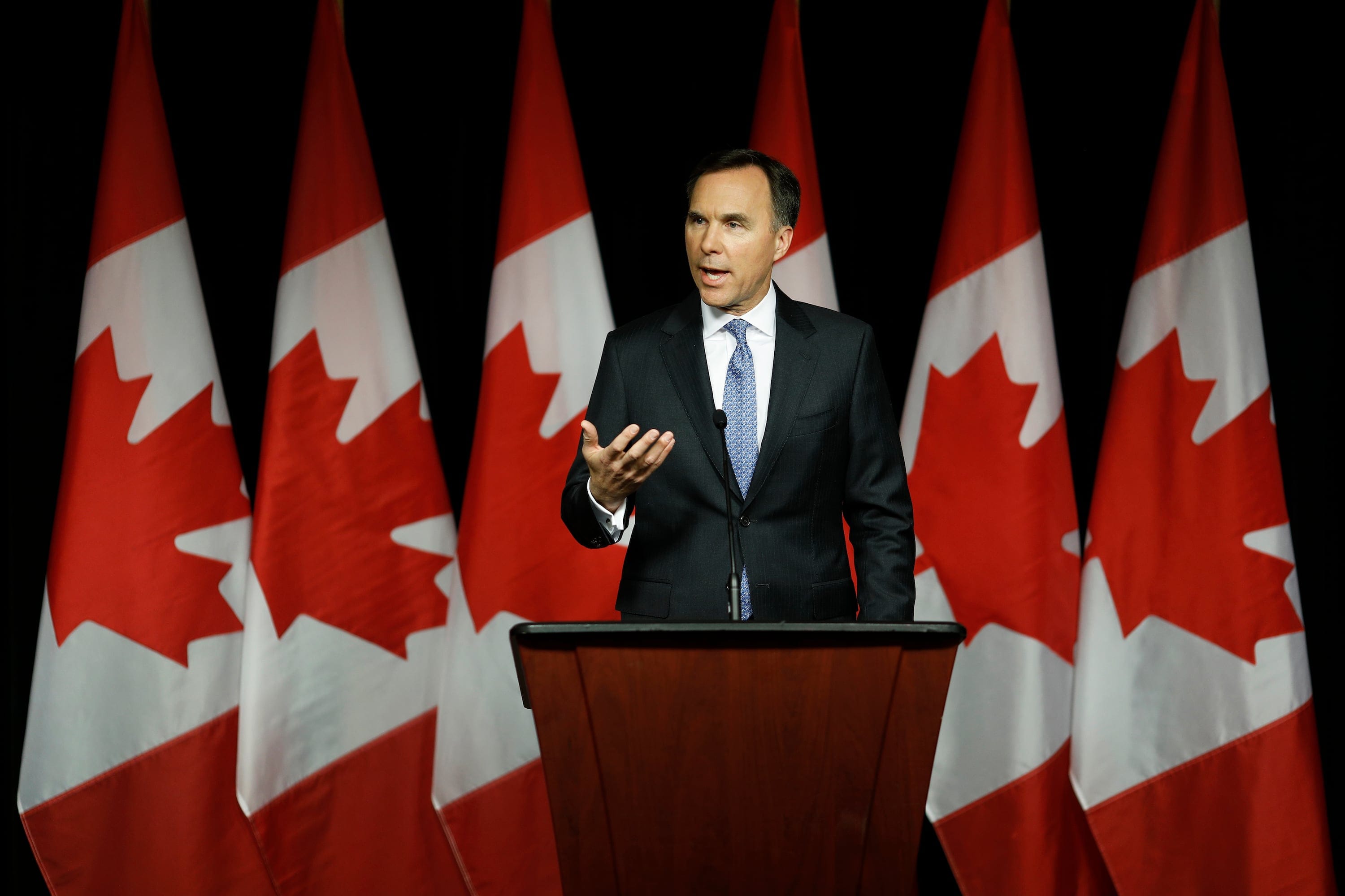 Finance Minister Bill Morneau speaks to reporters in Ottawa on March 19, 2019. (Photograph by Blair Gable)