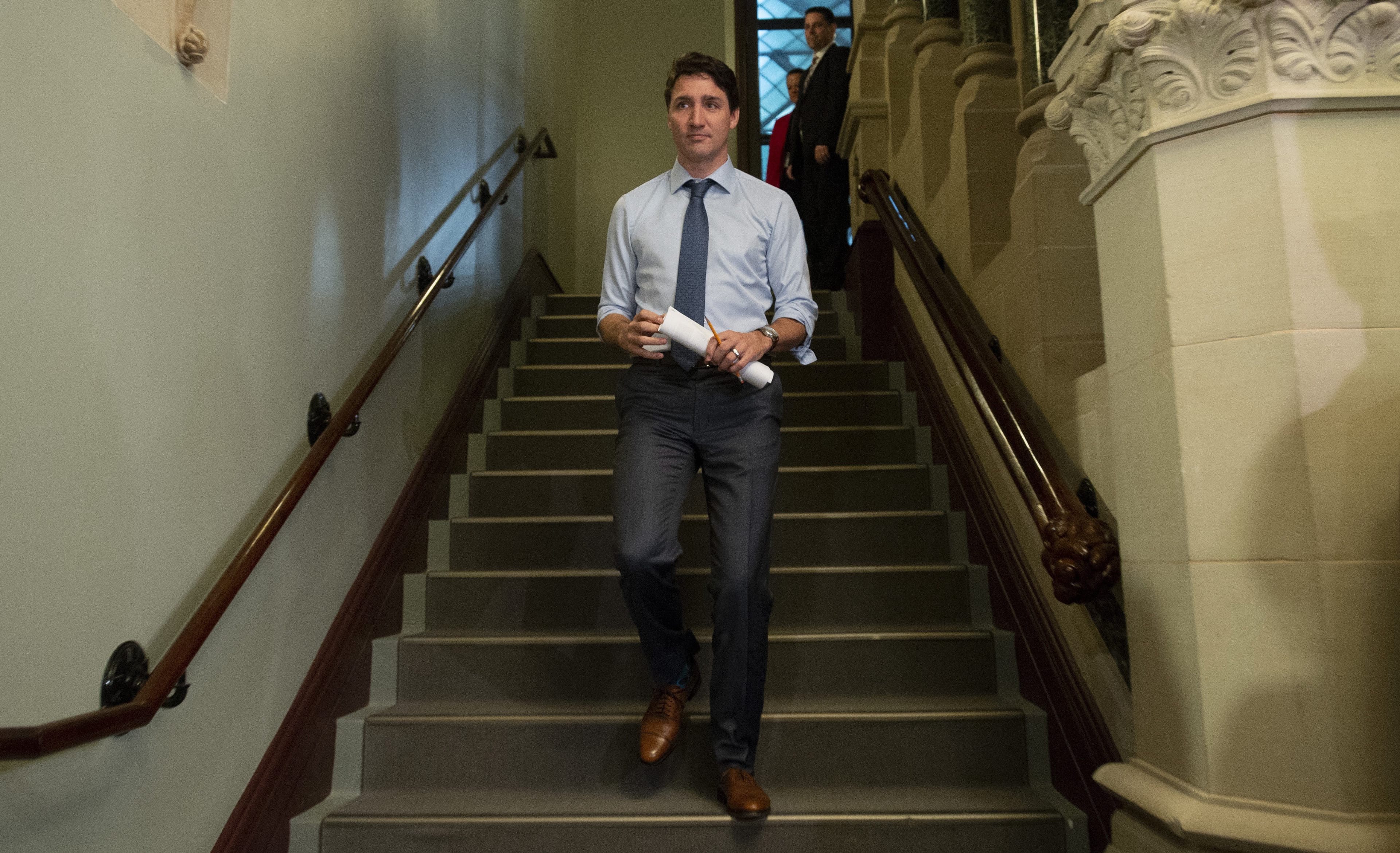 Trudeau makes his way to caucus on Parliament Hill in Ottawa, Wednesday, April 3, 2019. (THE CANADIAN PRESS/Adrian Wyld)
