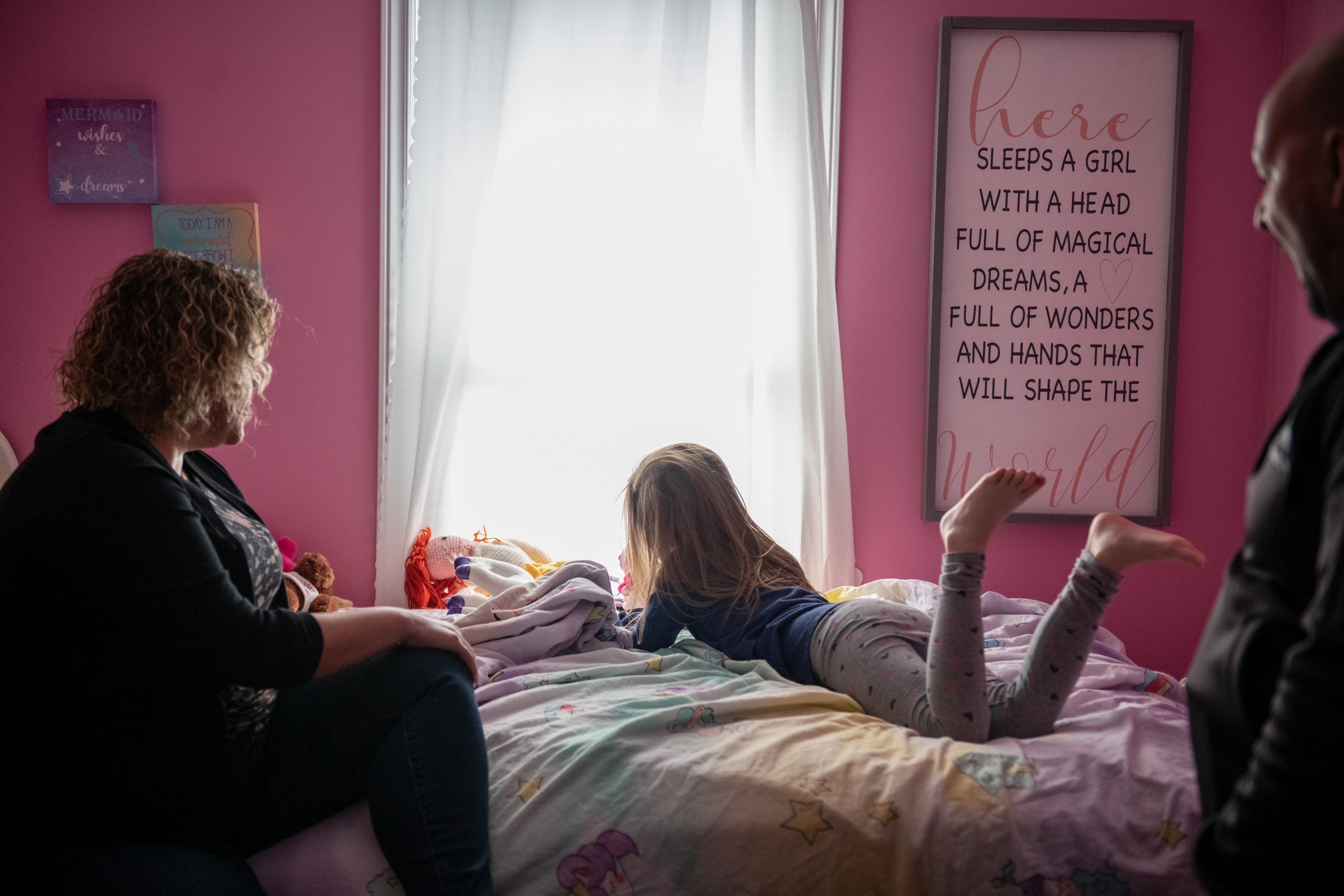 Katie, Franny and Mark: adoptive parents need time to bond with their children (Photograph by Galit Rodan)