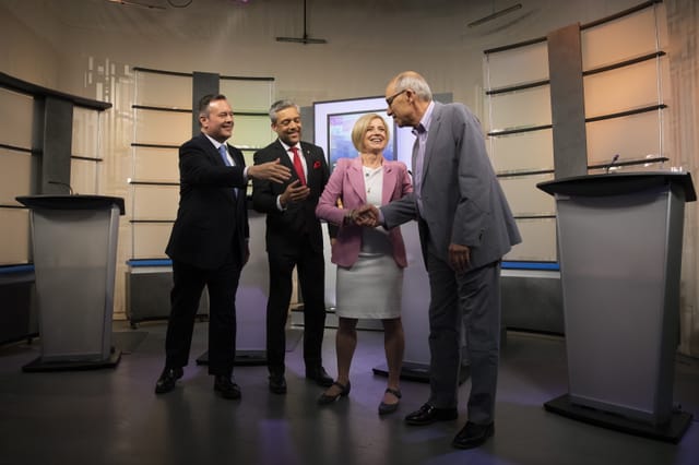 Left to right: UCP leader Jason Kenney; Alberta Liberal leader David Khan; NDP leader Rachel Notley and Alberta Party leader Stephen Mandel greet each before the start of a televised debate. (Codie McLachlan/CP)