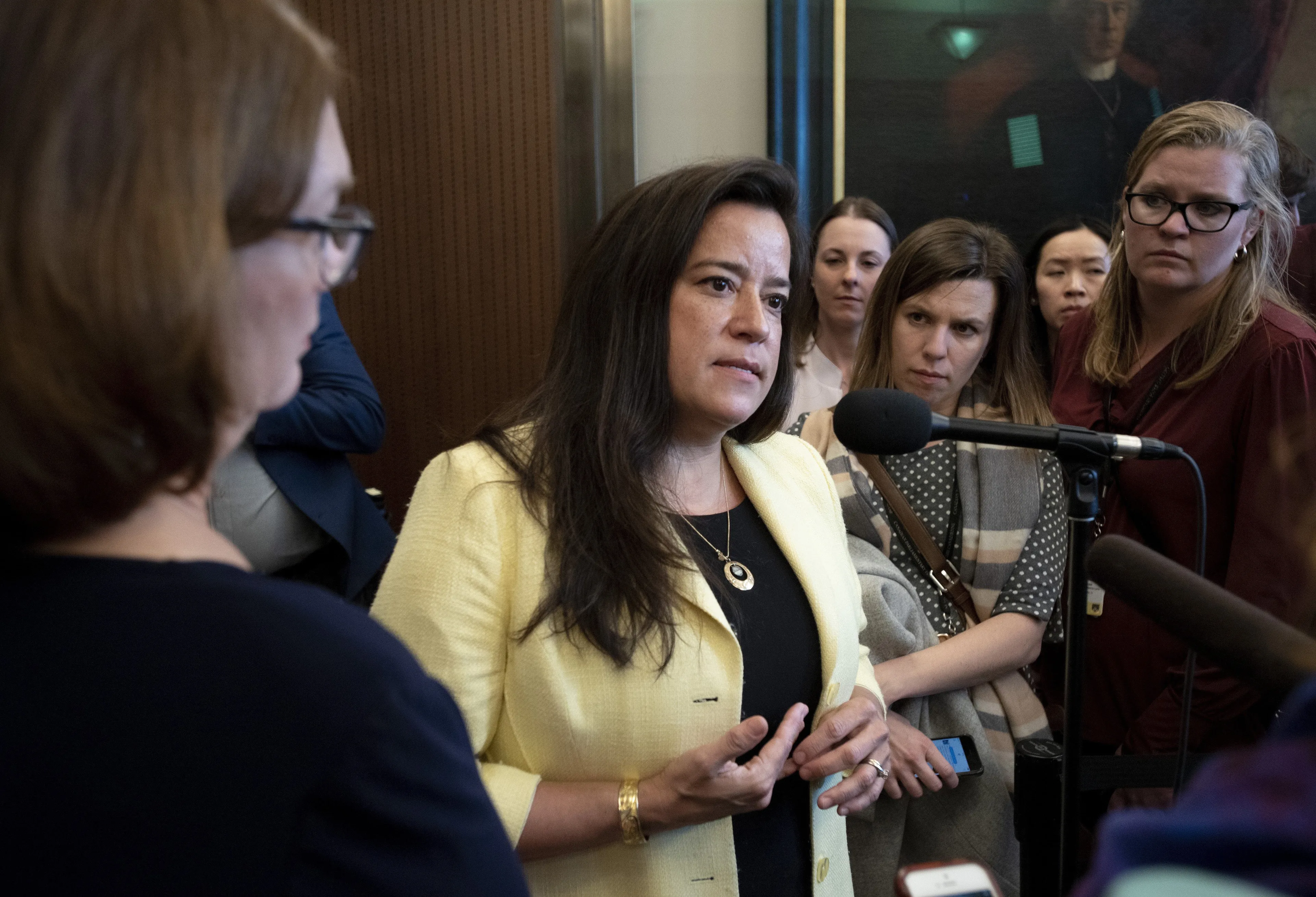 Independent MPs and former cabinet ministers Jody Wilson-Raybould, centre, and Jane Philpott, left, speak to reporters before Question Period on Parliament Hill in Ottawa, a day after being removed from the Liberal caucus on Wednesday, April 3, 2019. THE CANADIAN PRESS/Justin Tang
