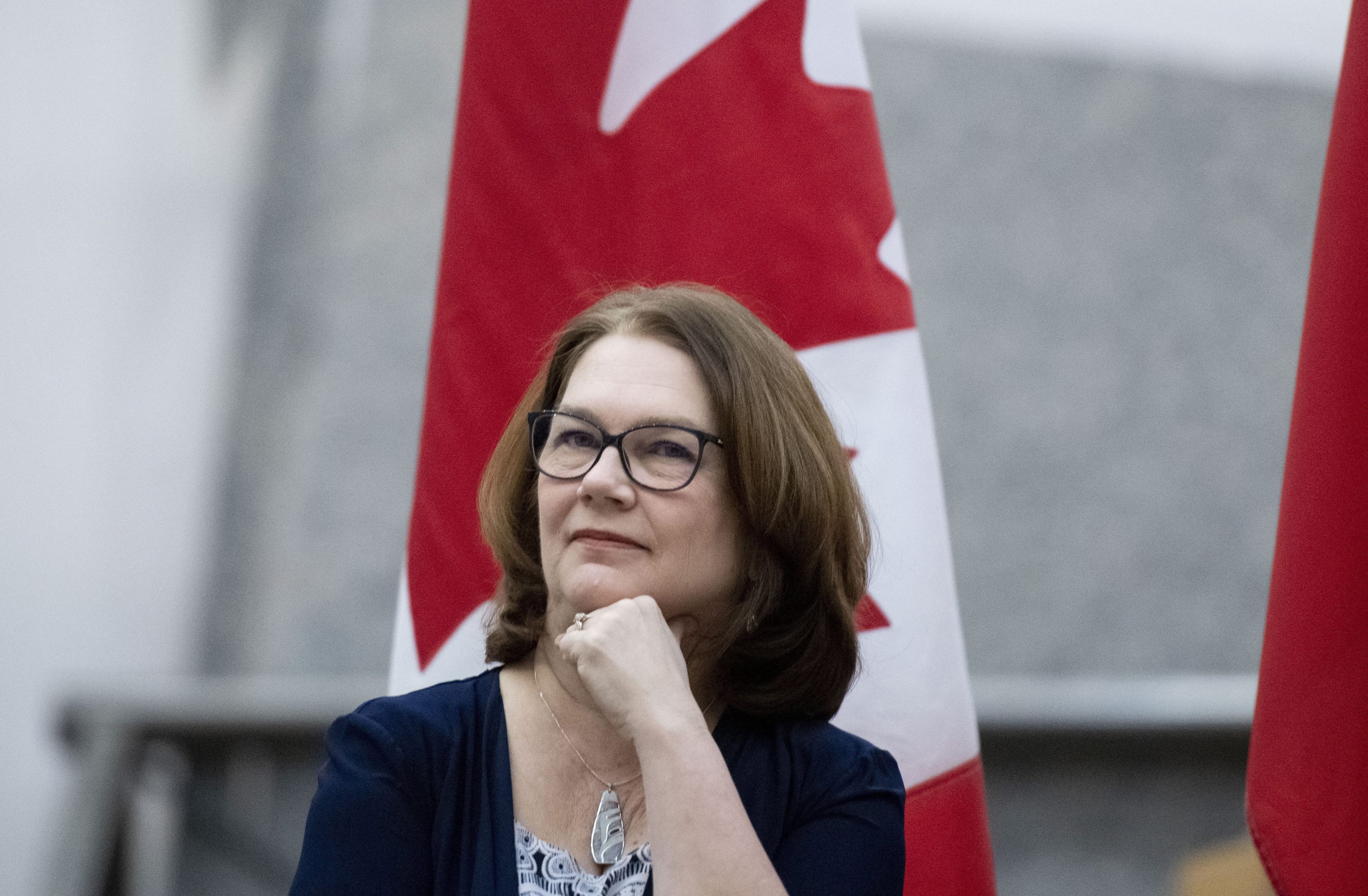 Liberal MP Jane Philpott, waits to deliver a keynote speech at an International Women's Day event at Ottawa City Hall on Friday, March 8, 2019. THE CANADIAN PRESS/Justin Tang