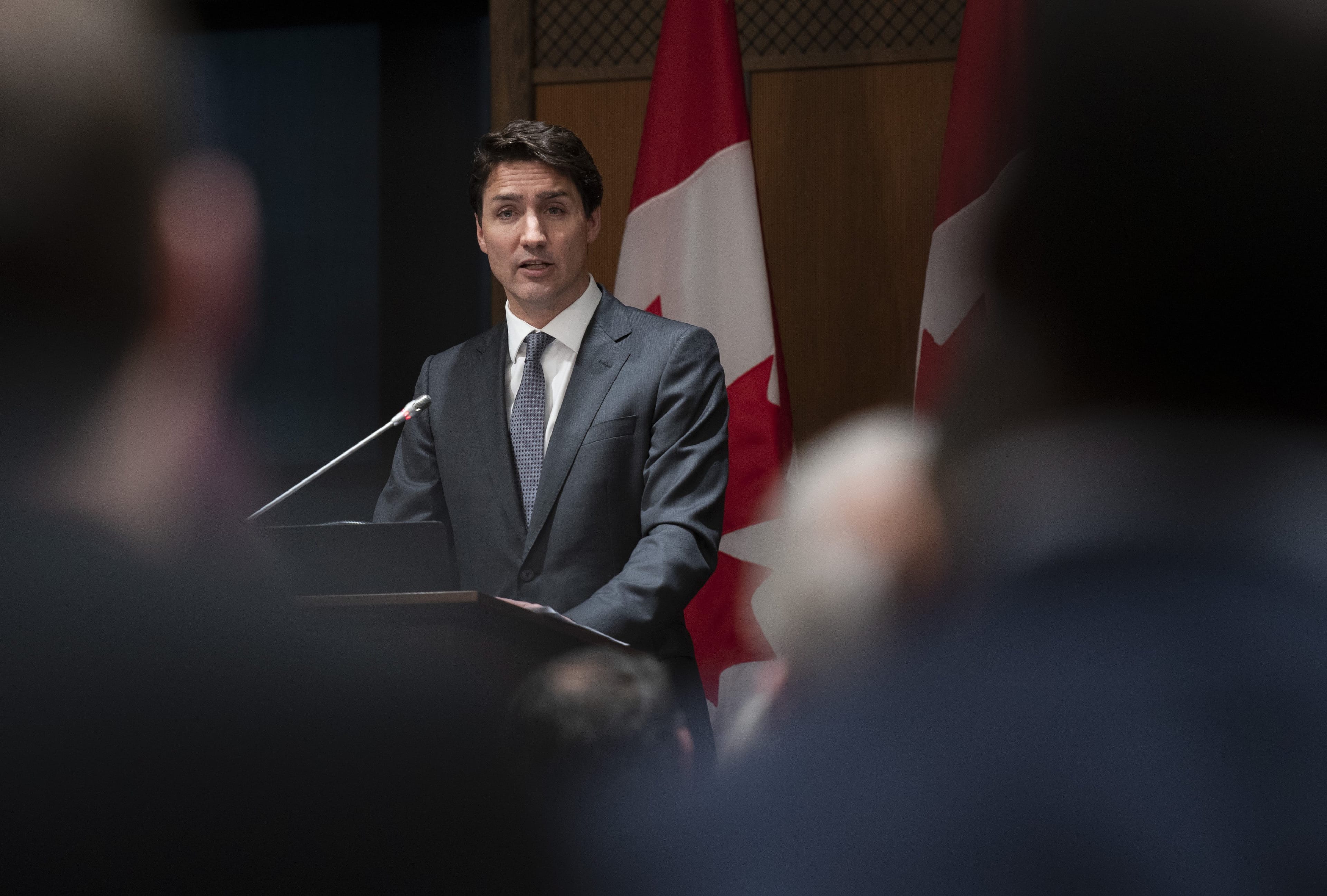 Prime Minister Justin Trudeau speaks at an evening caucus meeting on Parliament Hill in Ottawa on Tuesday, April 2, 2019. Trudeau has kicked both former attorney general Jody Wilson-Raybould and fellow ex-cabinet minister Jane Philpott out of the Liberal caucus. THE CANADIAN PRESS/Justin Tang