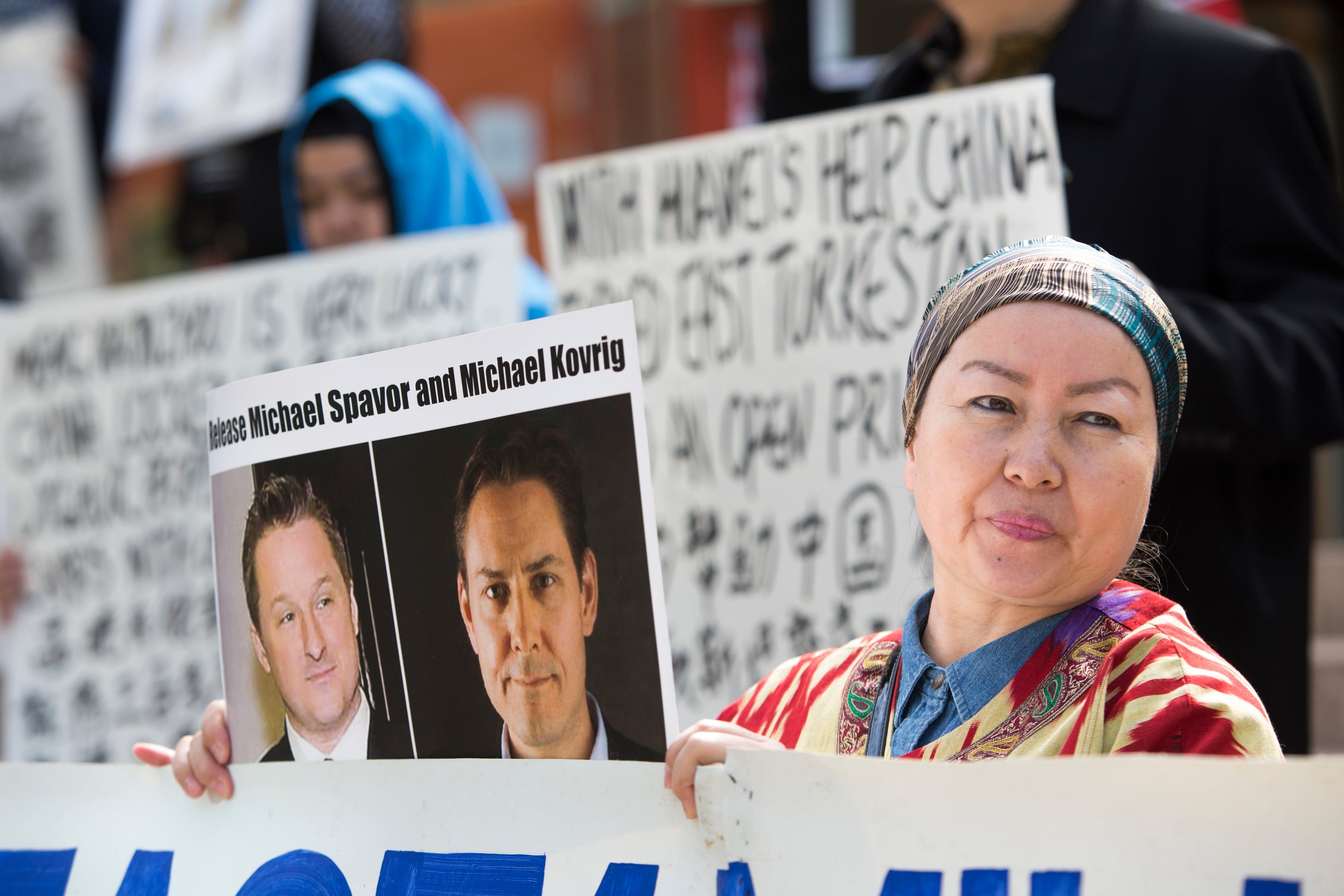 Turnisa Matsedik-Qira, of the Vancouver Uyghur Association, demonstrates against China's treatment of Uyghurs outside a court appearance for Huawei's Meng Wanzhou in Vancouver on May 8, 2019. (Jason Redmond/AFP/Getty Images)