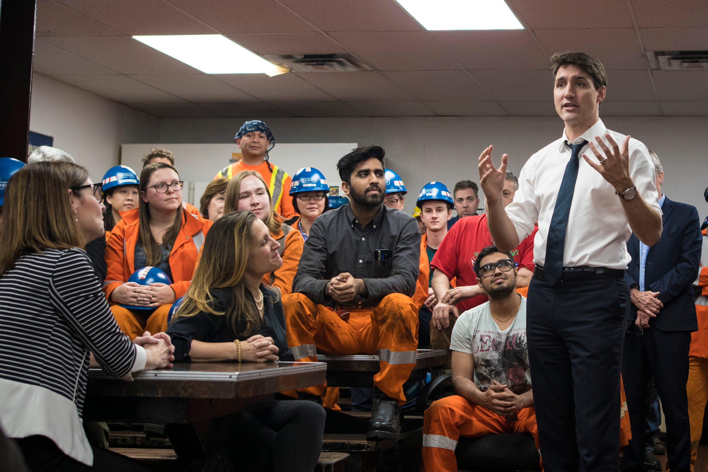 Prime Minister Justin Trudeau speaks with employees at Stelco in Hamilton, Ont., on May 17, 2019. (Tijana Martin/CP)