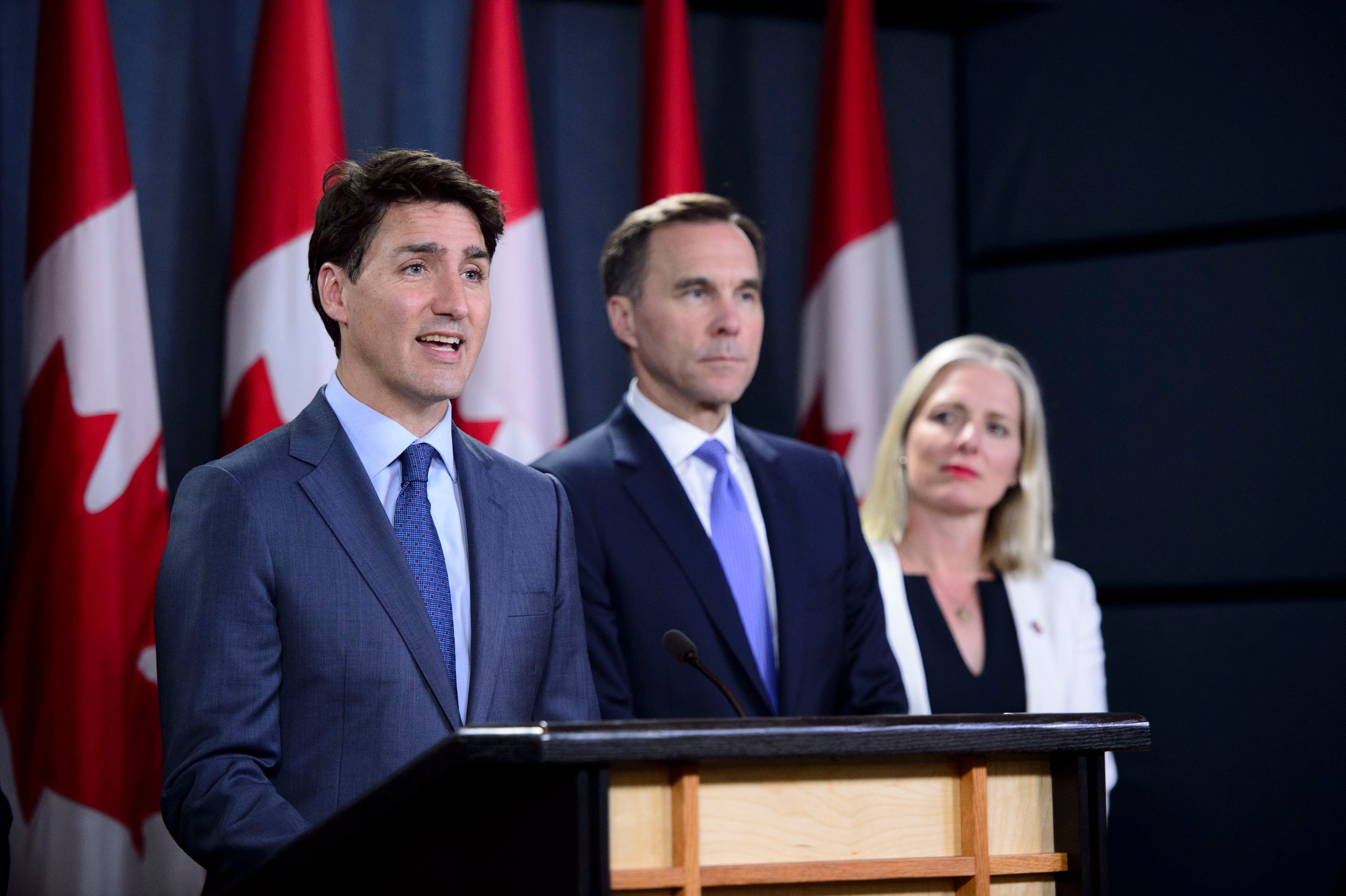 Trudeau makes an announcement about the Trans Mountain Expansion Project with McKenna and Minister of Finance Bill Morneau, in Ottawa on June 18, 2019. (THE CANADIAN PRESS/Sean Kilpatrick)