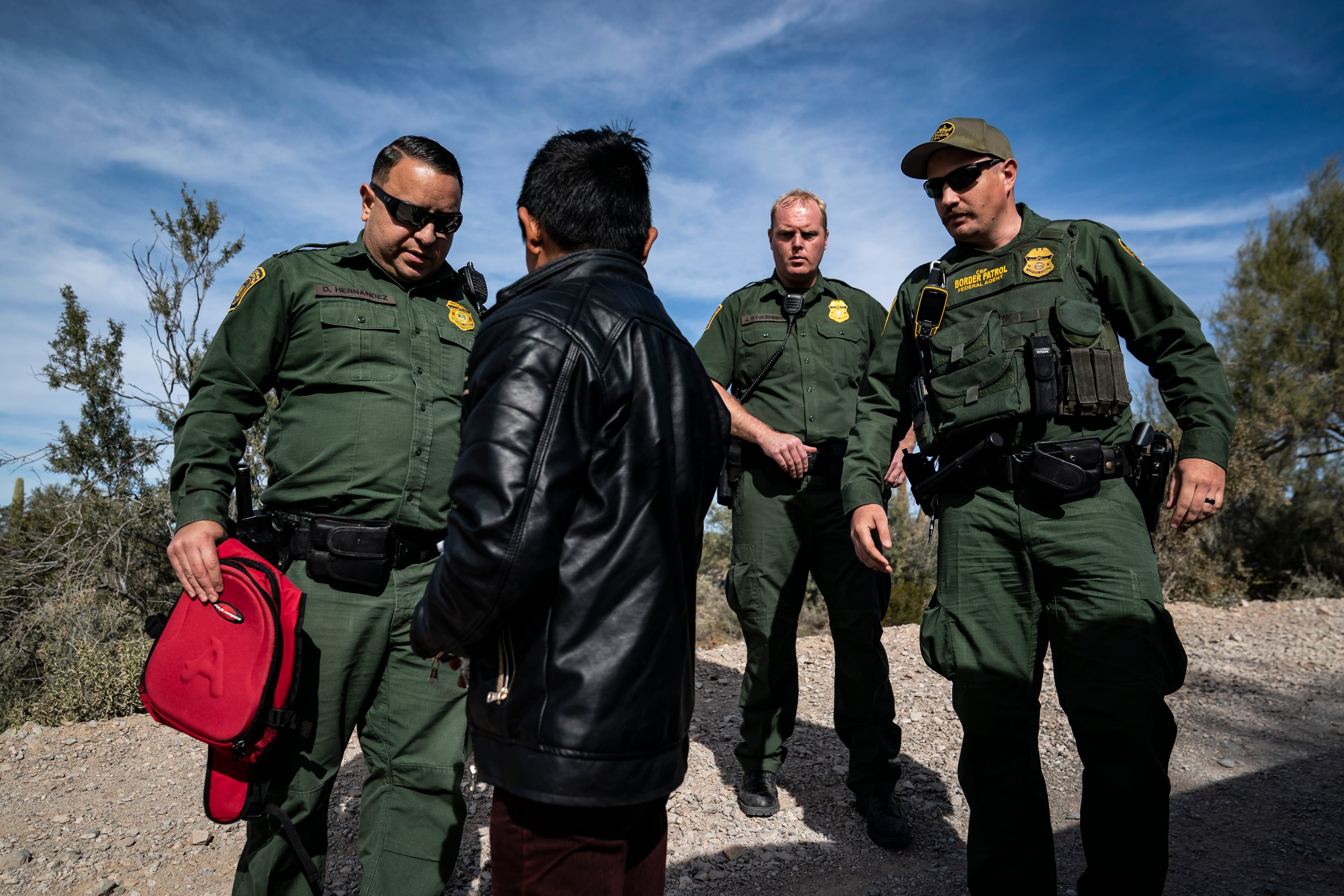 Border Patrol Agents detain a 14-year-old boy from Guatemala who was arrested after illegally crossing the U.S.-Mexico border alone in Organ Pipe Cactus National Monument on Jan. 18, 2019 in Ajo, AZ. (Photo by Jabin Botsford/The Washington Post via Getty Images)