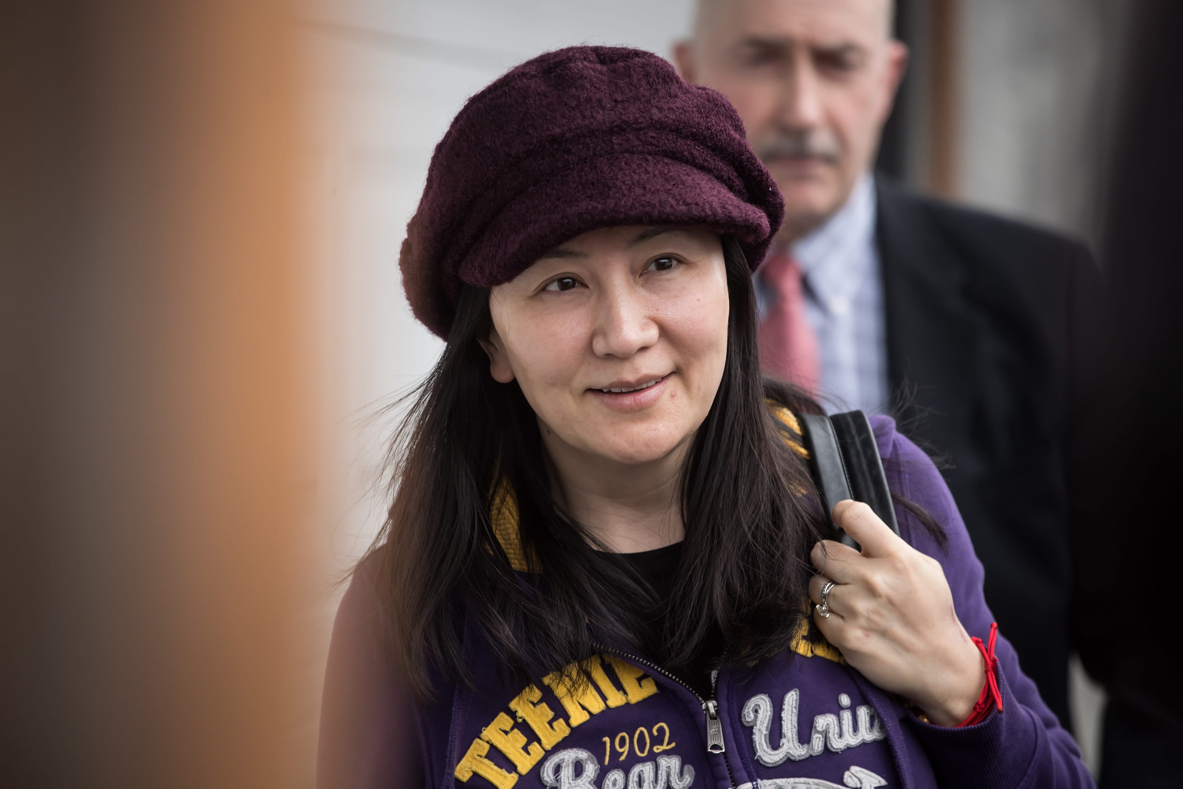 Meng coming home from a court appearance in March (Darryl Dyck/CP)