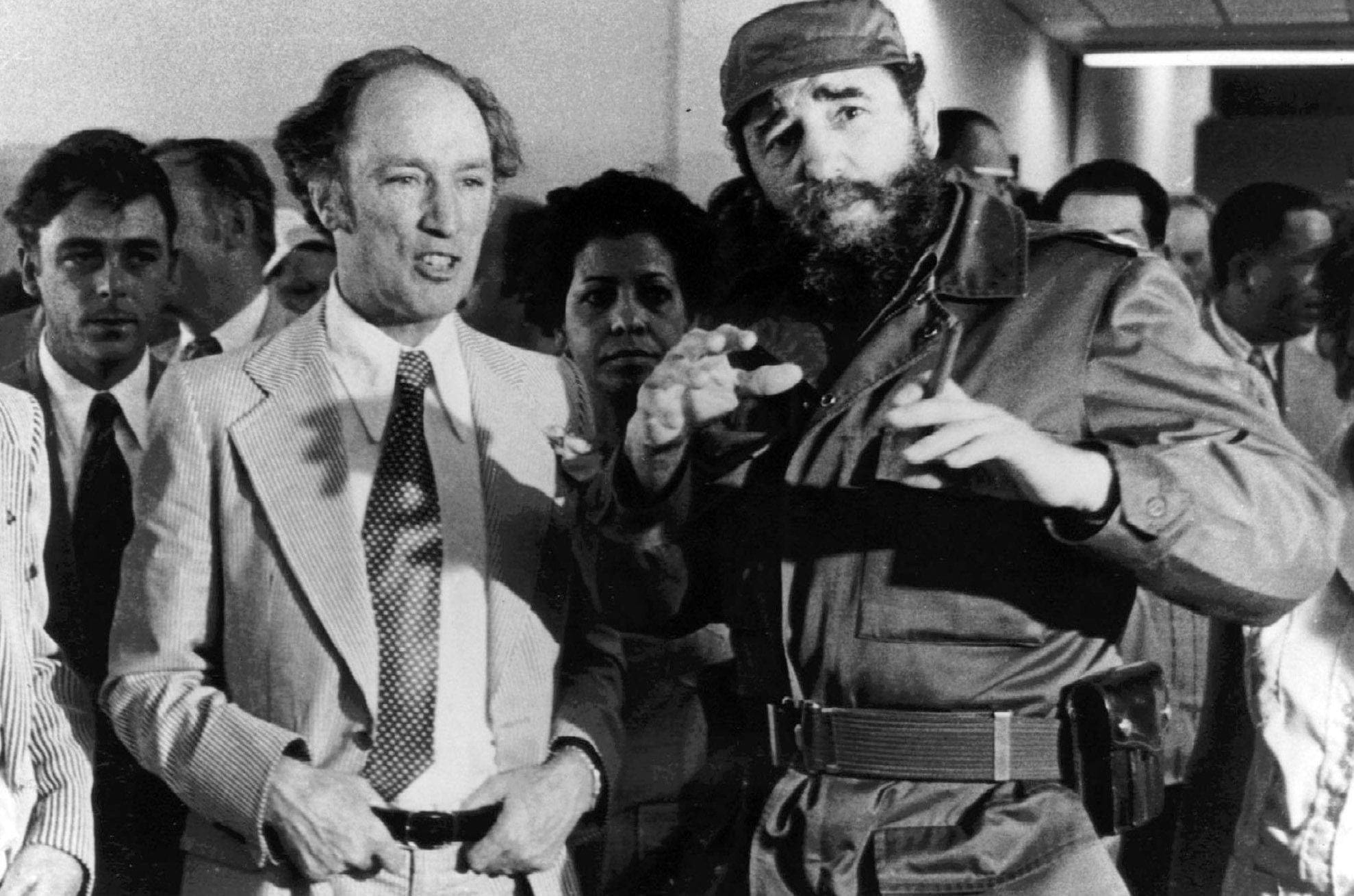 Prime Minister Pierre Trudeau looks on as Cuban President Fidel Castro gestures during a visit in Havana on Jan. 27, 1976. (Fred Chartrand/CP)