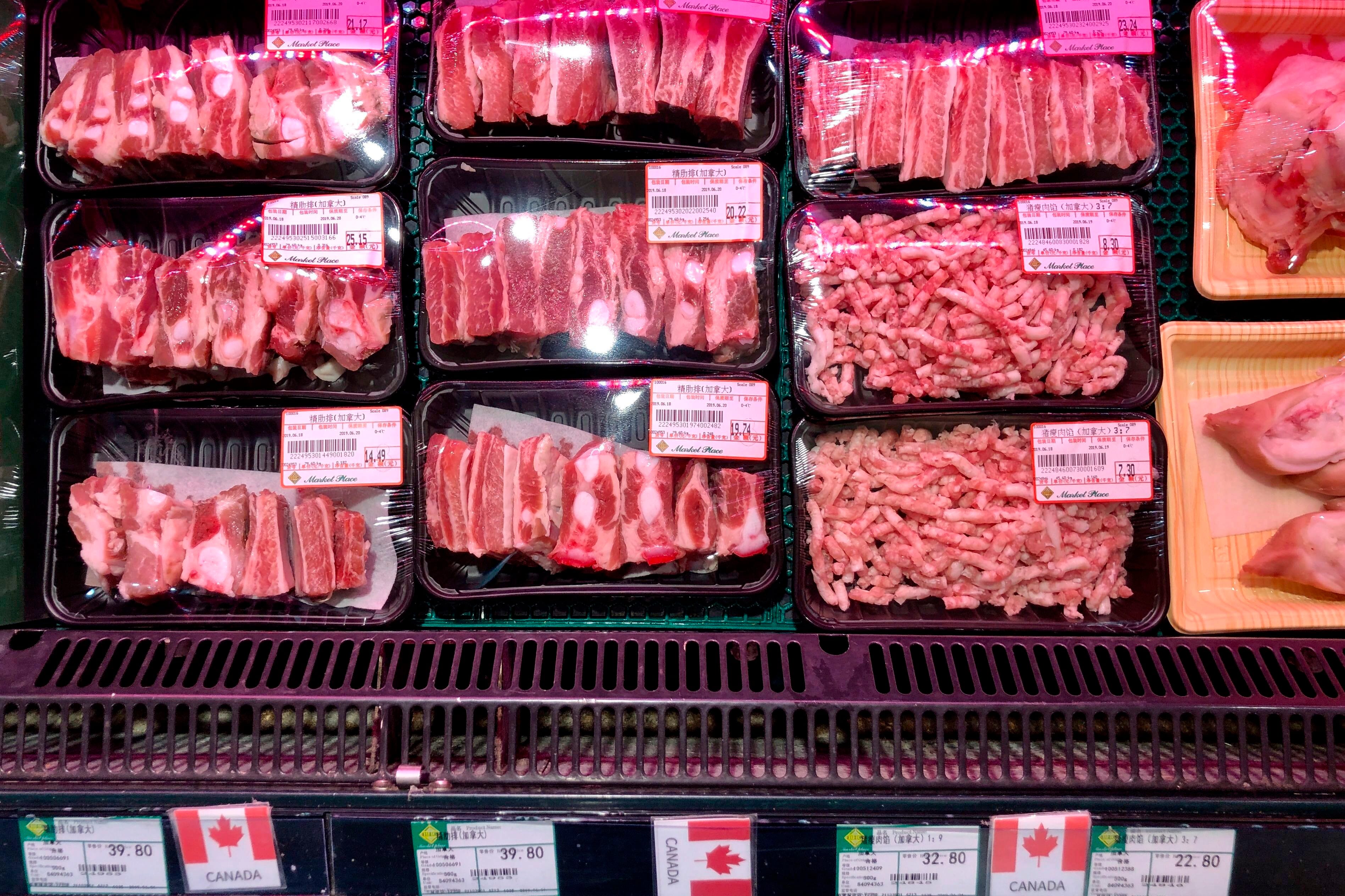Packs of Canadian pork are displayed for sale at a supermarket in Beijing, Tuesday, June 18, 2019. (Andy Wong/AP)