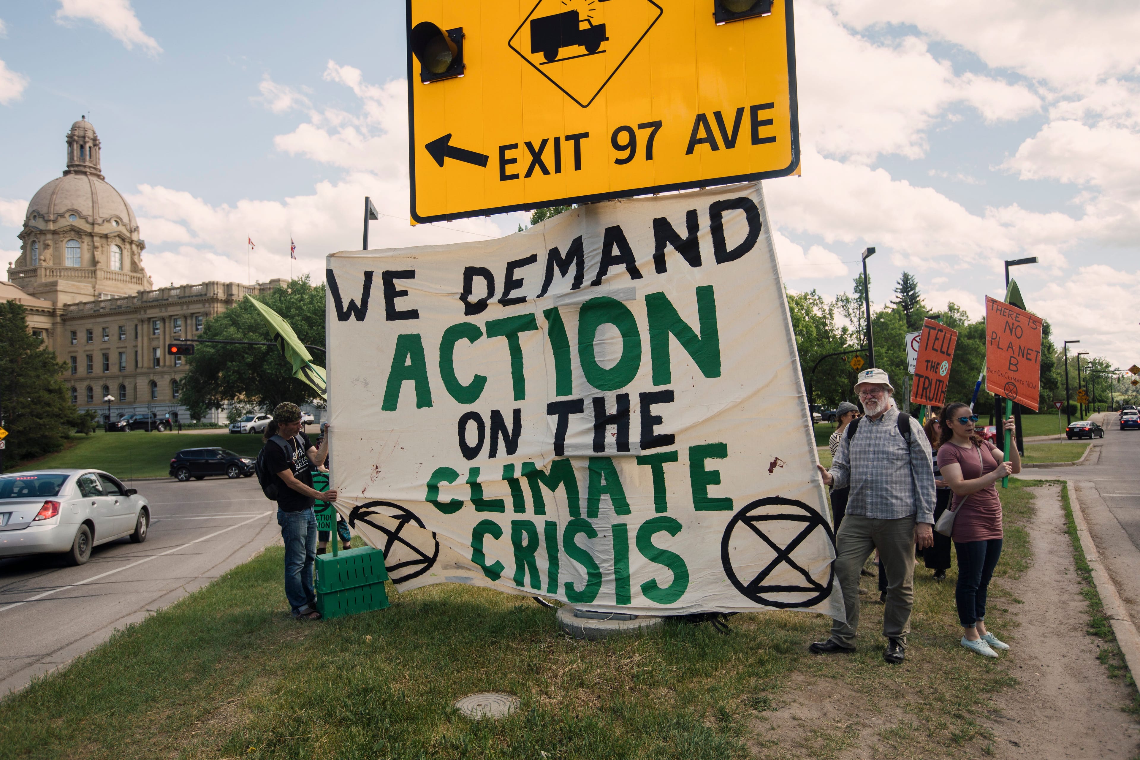 A protest outside the Alberta legislature, organized by Extinction Rebellion, in response to Alberta climate policy and the federal approval of the Trans Mountain Pipeline (Amber Bracken/CP)