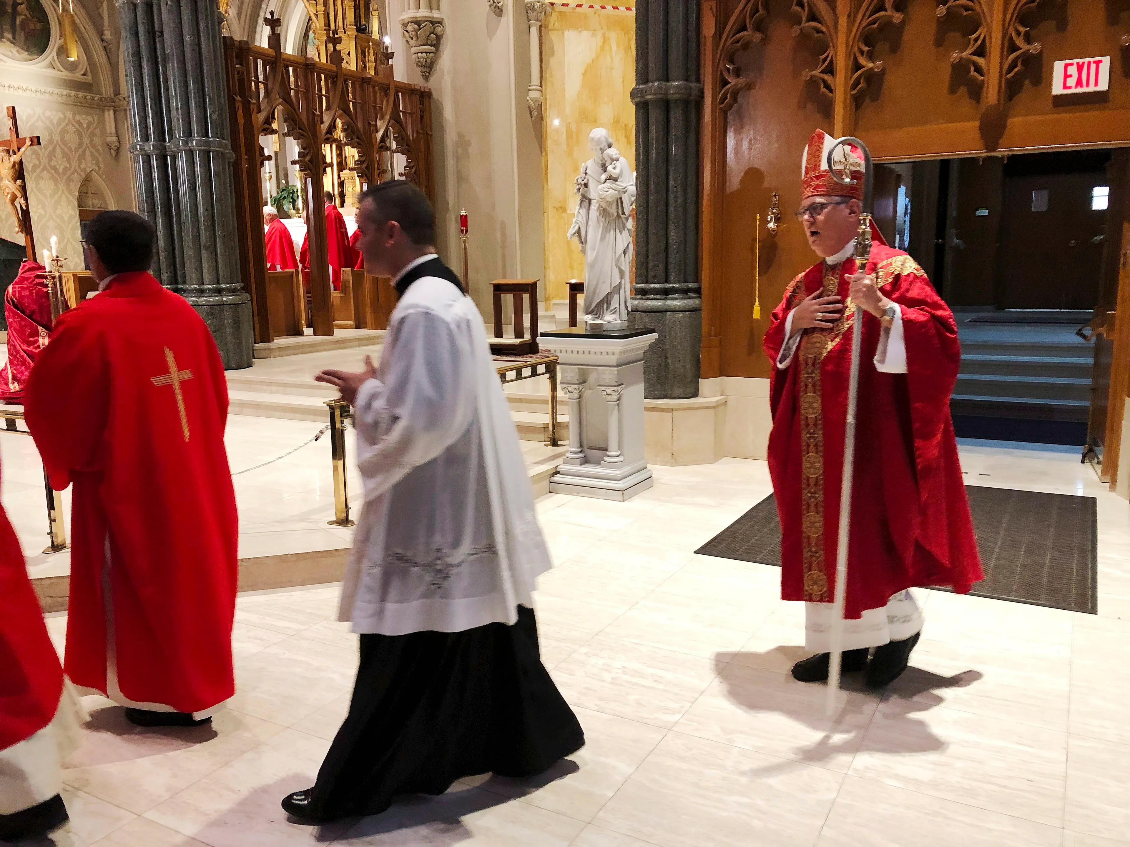 Providence diocese Bishop Thomas Tobin, right, enters the during the processional at the Cathedral of Saints Peter and Paul in Providence, R.I., Friday, Sept. 14, 2018. (Jennifer McDermott/AP)