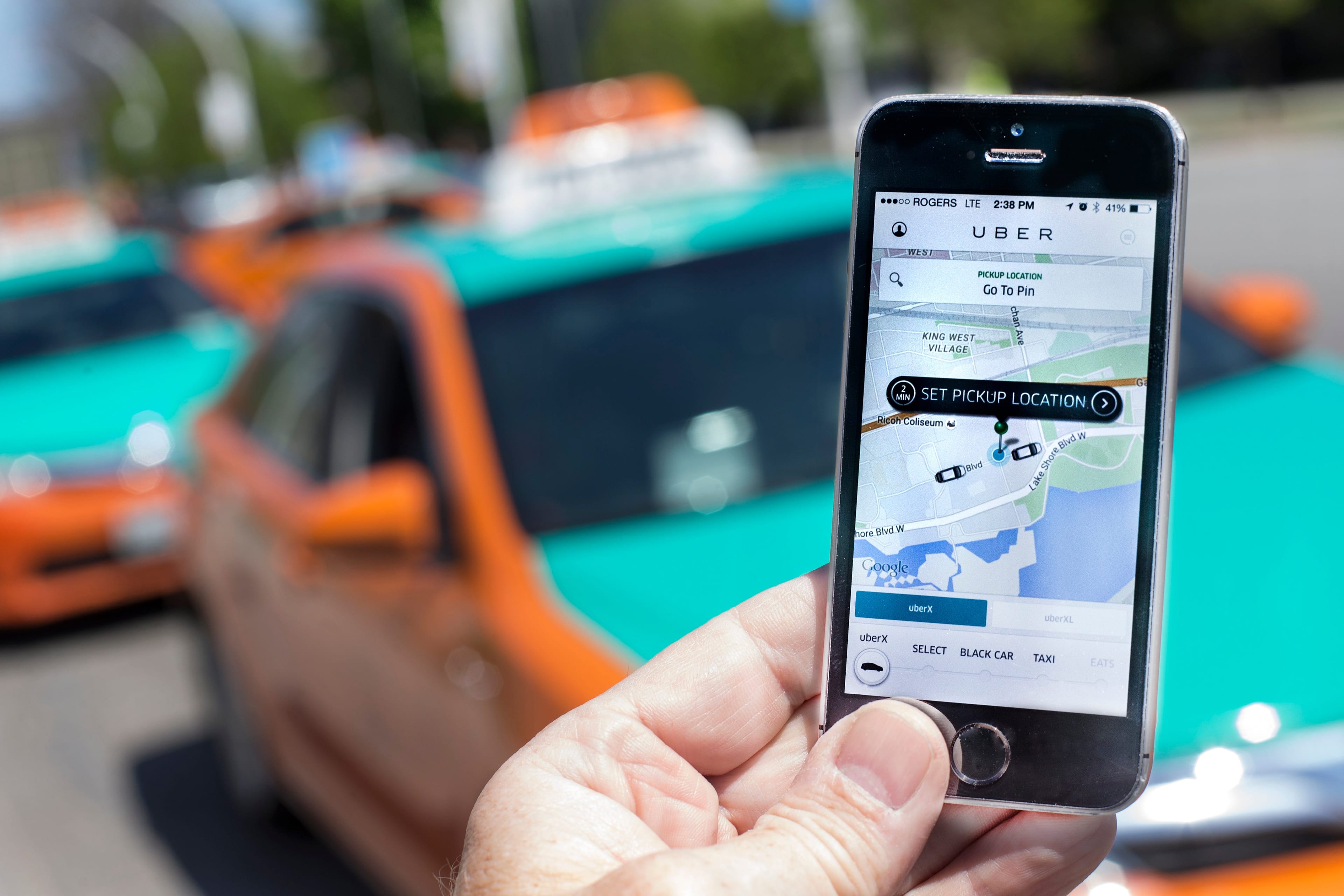 Photographed at The CNE, Toronto, Uber taxi service is a new way to travel around the city. Request and payment are all made using an app. (Bernard Weil/Toronto Star/Getty Images)