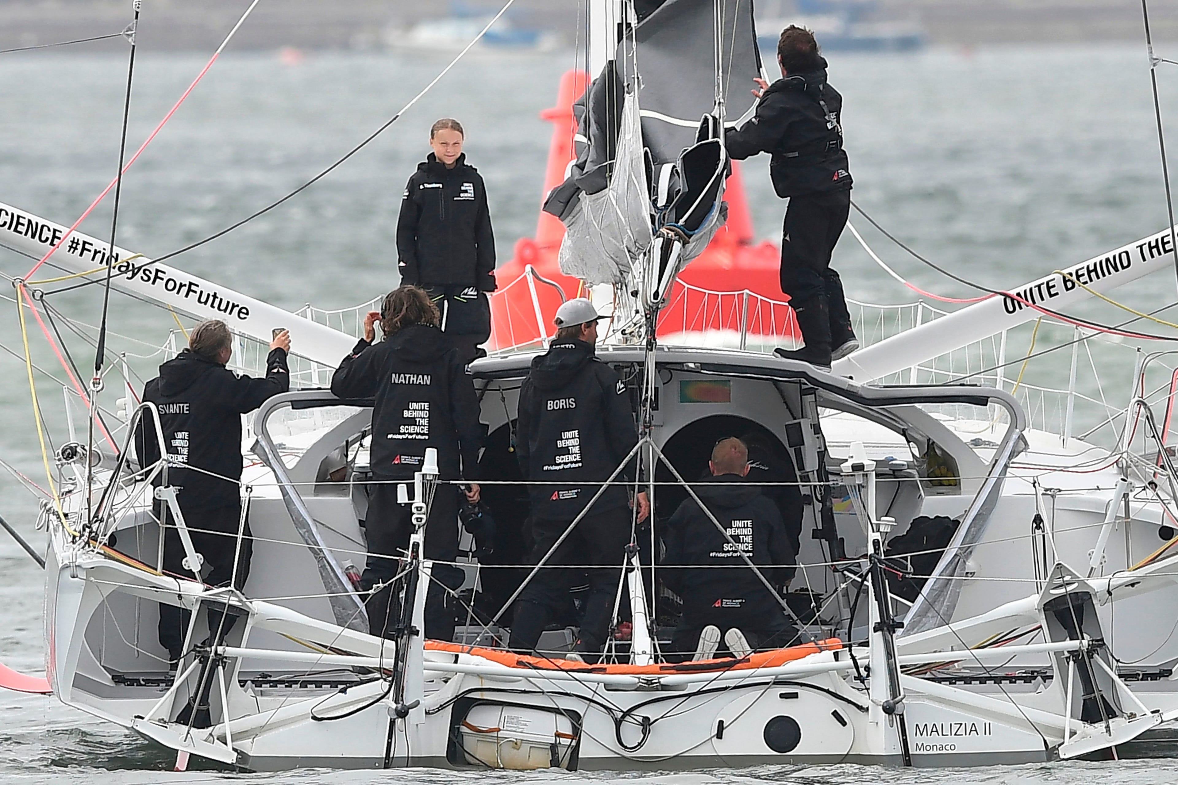 Thunberg stands aboard the Malizia II IMOCA class sailing yacht off the coast of Plymouth, southwest England, on Aug. 14, 2019 (Ben Stansall/AFP/Getty Images)