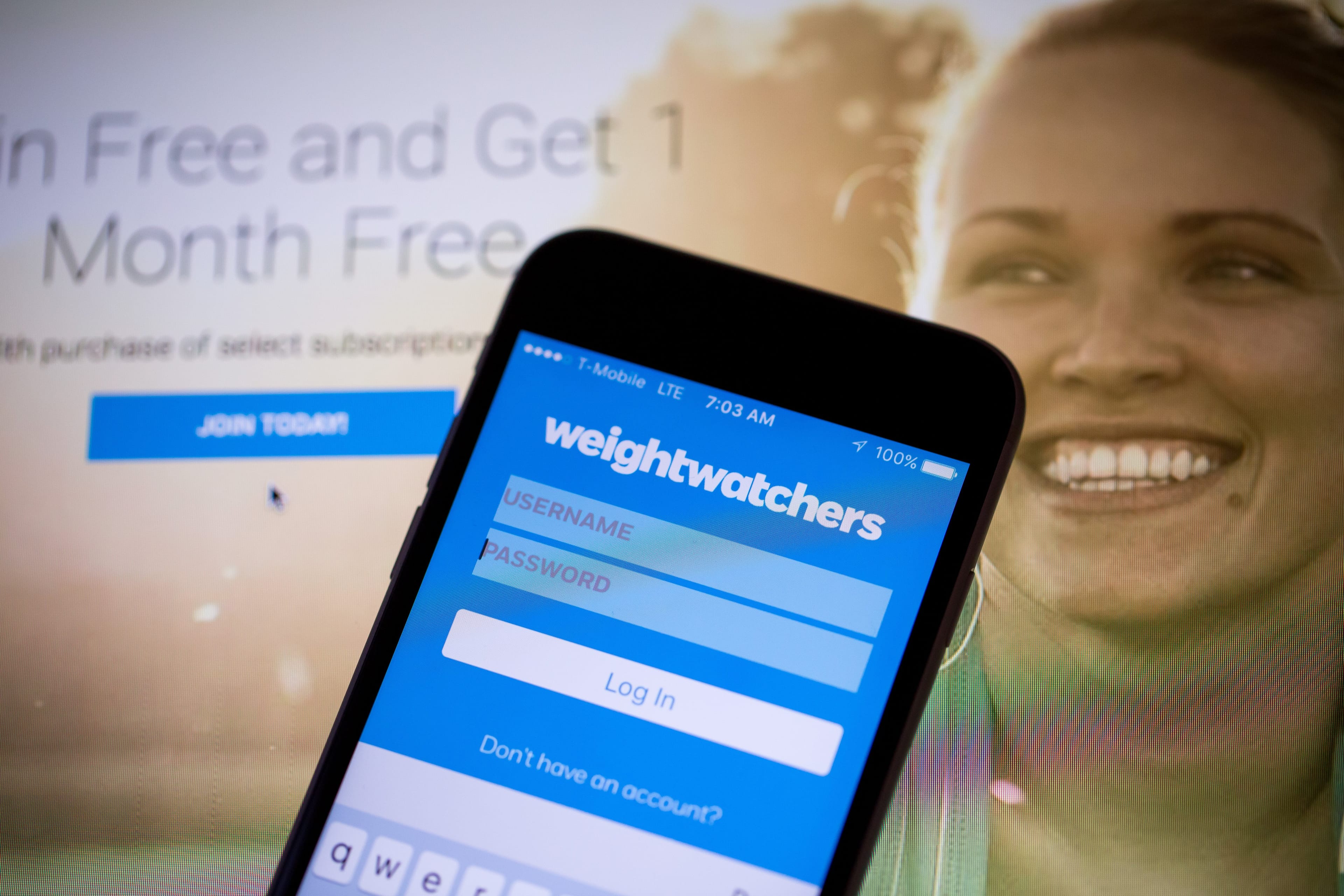 The Weight Watchers International Inc. mobile application is displayed on an Apple Inc. iPhone 6s. (Michael Nagle/Bloomberg/Getty Images)