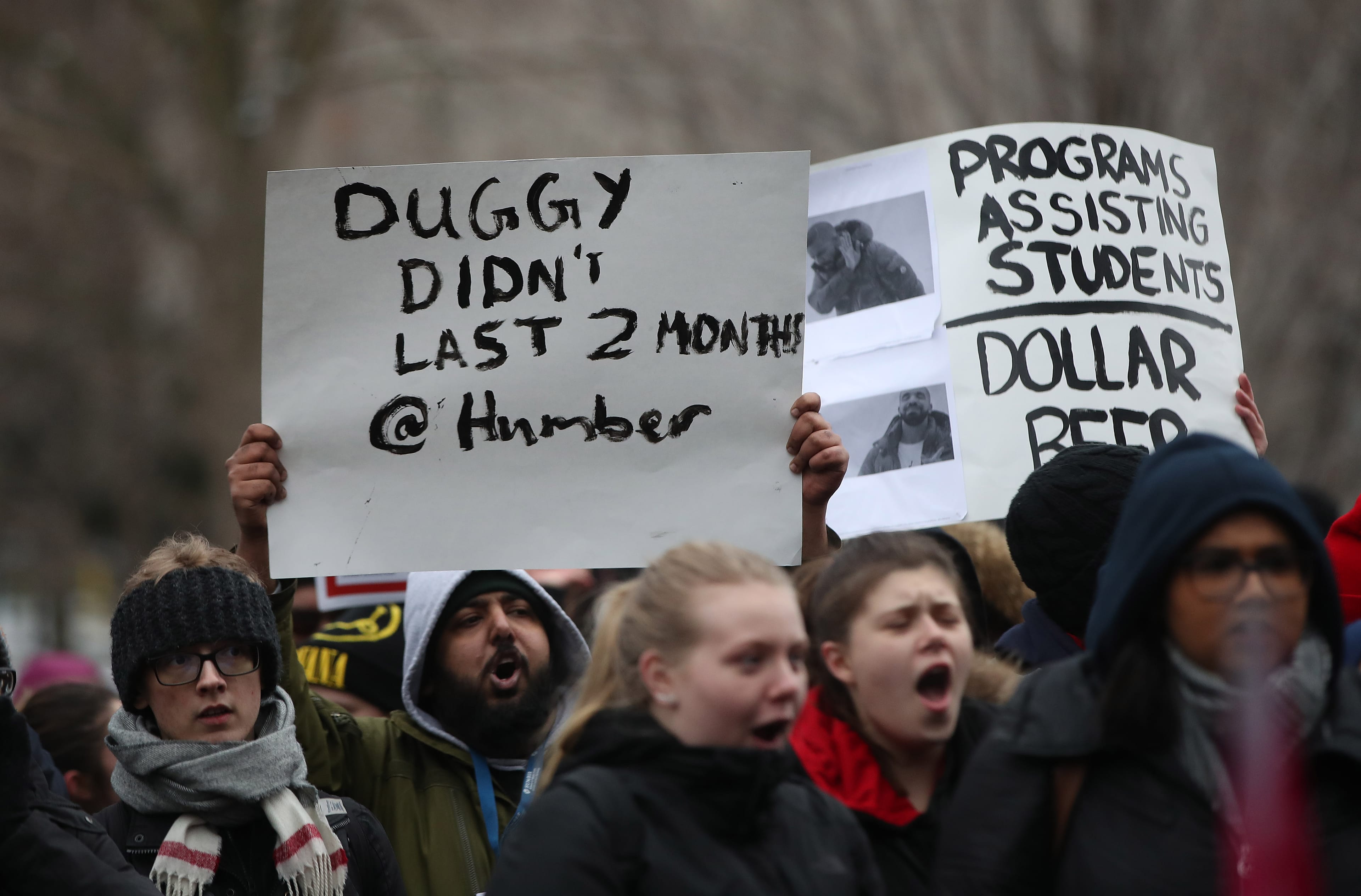 Students hold up a signs and chant. The Canadian Federation of Students (CFS) held an Emergency We Are the Students Rally at Queen's Park to protest the cuts to OSAP and campus groups that accompanied the planned 10 percent tuition reduction at Queen's Park in Toronto. January 18, 2019. (Steve Russell/Toronto Star/Getty Images)