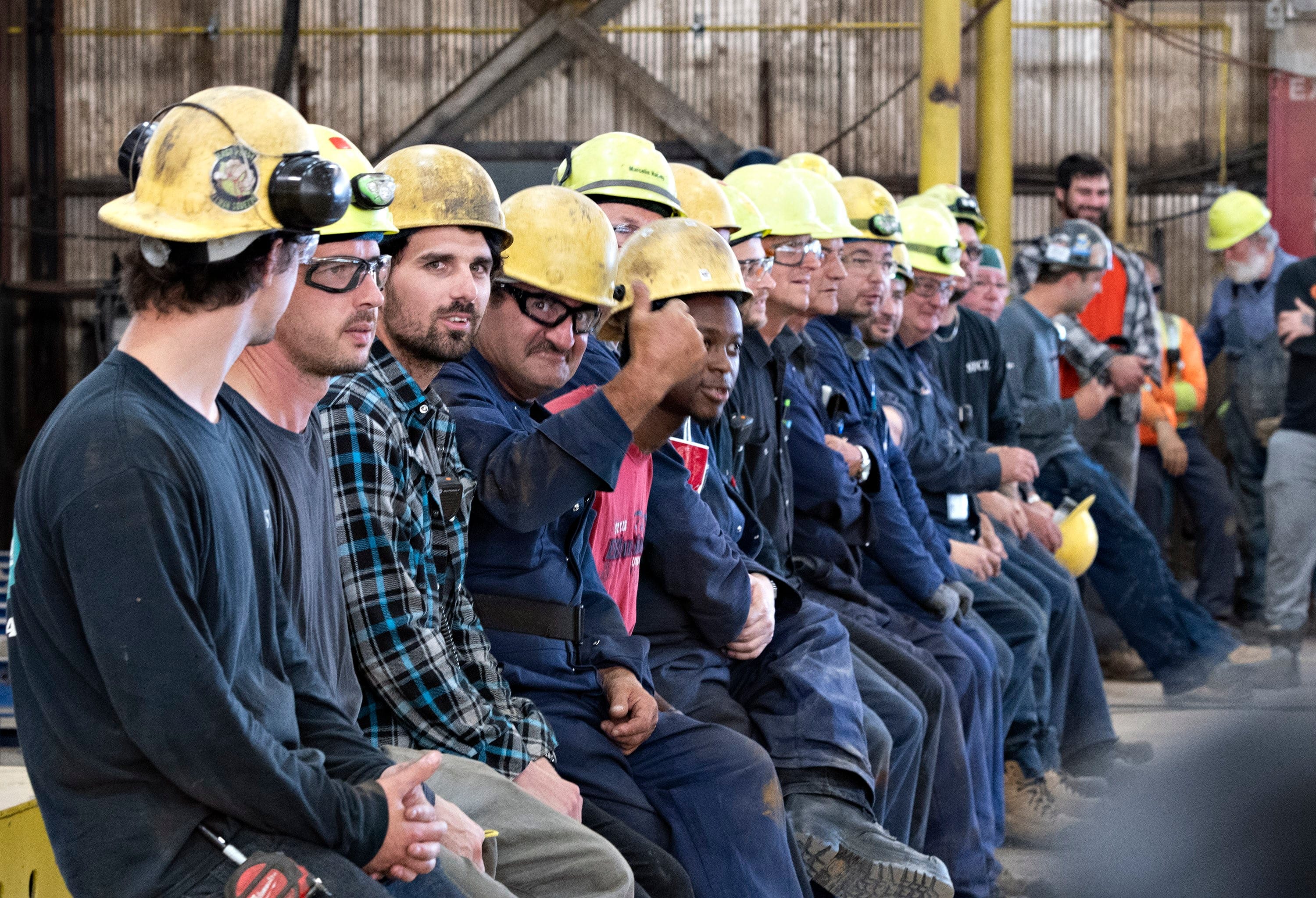 Workers listen to a contract announcement at Davie shipyard on July 16, 2019, in Levis Que (Jacques Boissinot/CP)
