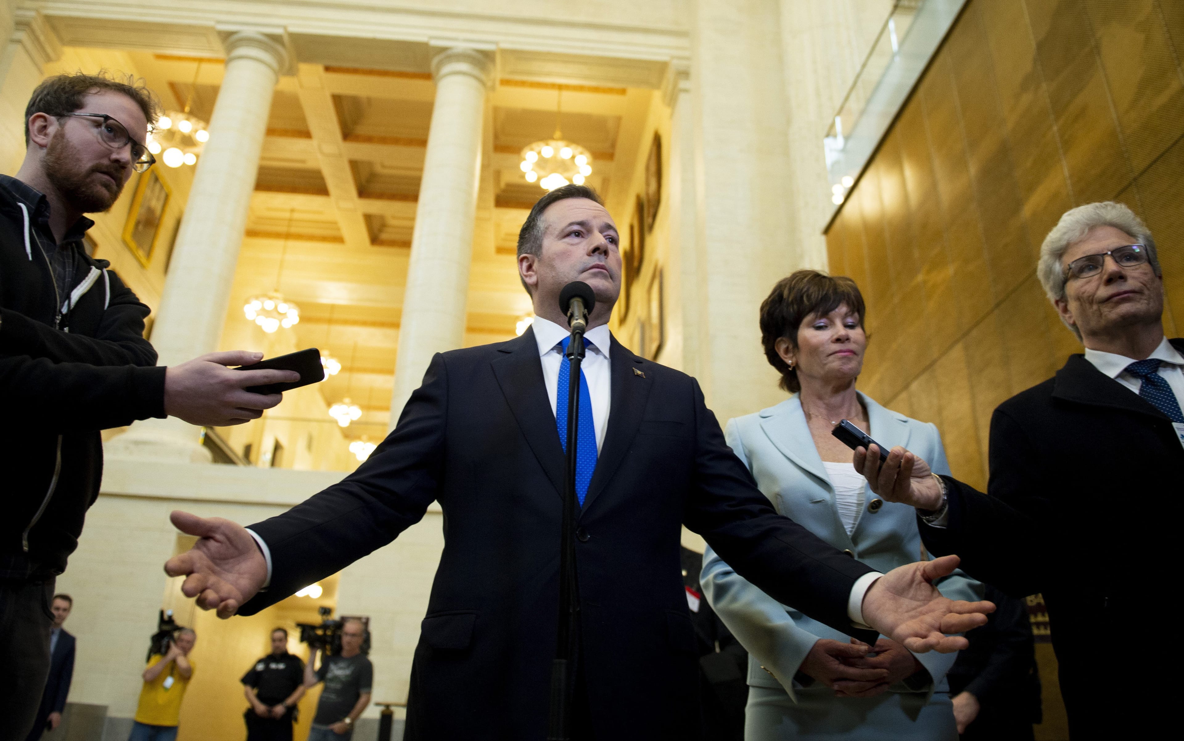 Alberta Premier Jason Kenney reacts to a question as he speaks to reporters after appearing at the Standing Senate Committee on Energy, the Environment and Natural Resources on May 2, 2019. (CP/Justin Tang)
