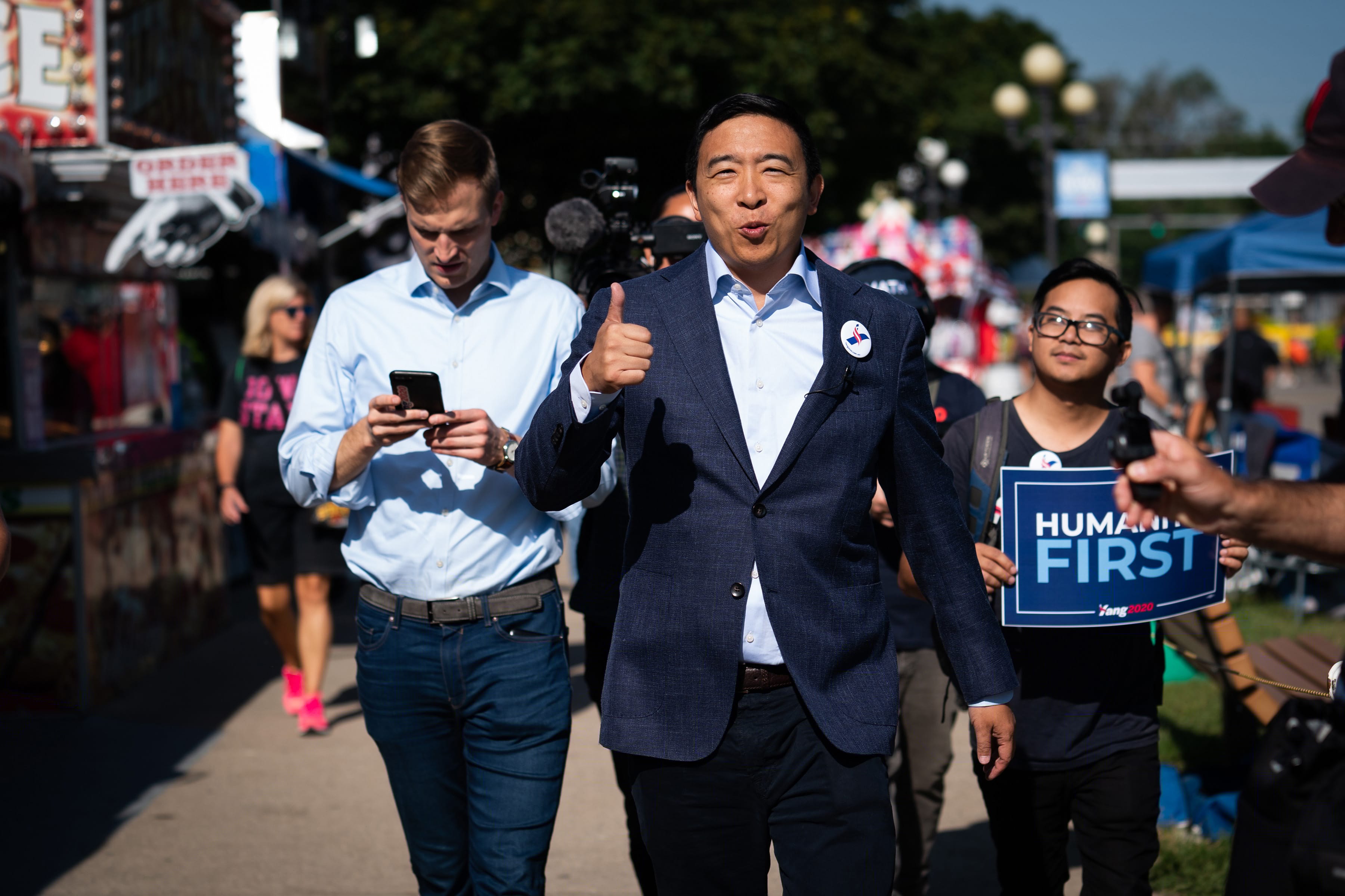 Yang, a Democratic presidential hopeful, walks through the Iowa State Fair in Des Moines (Erin Schaff/The New York Times/Redux)