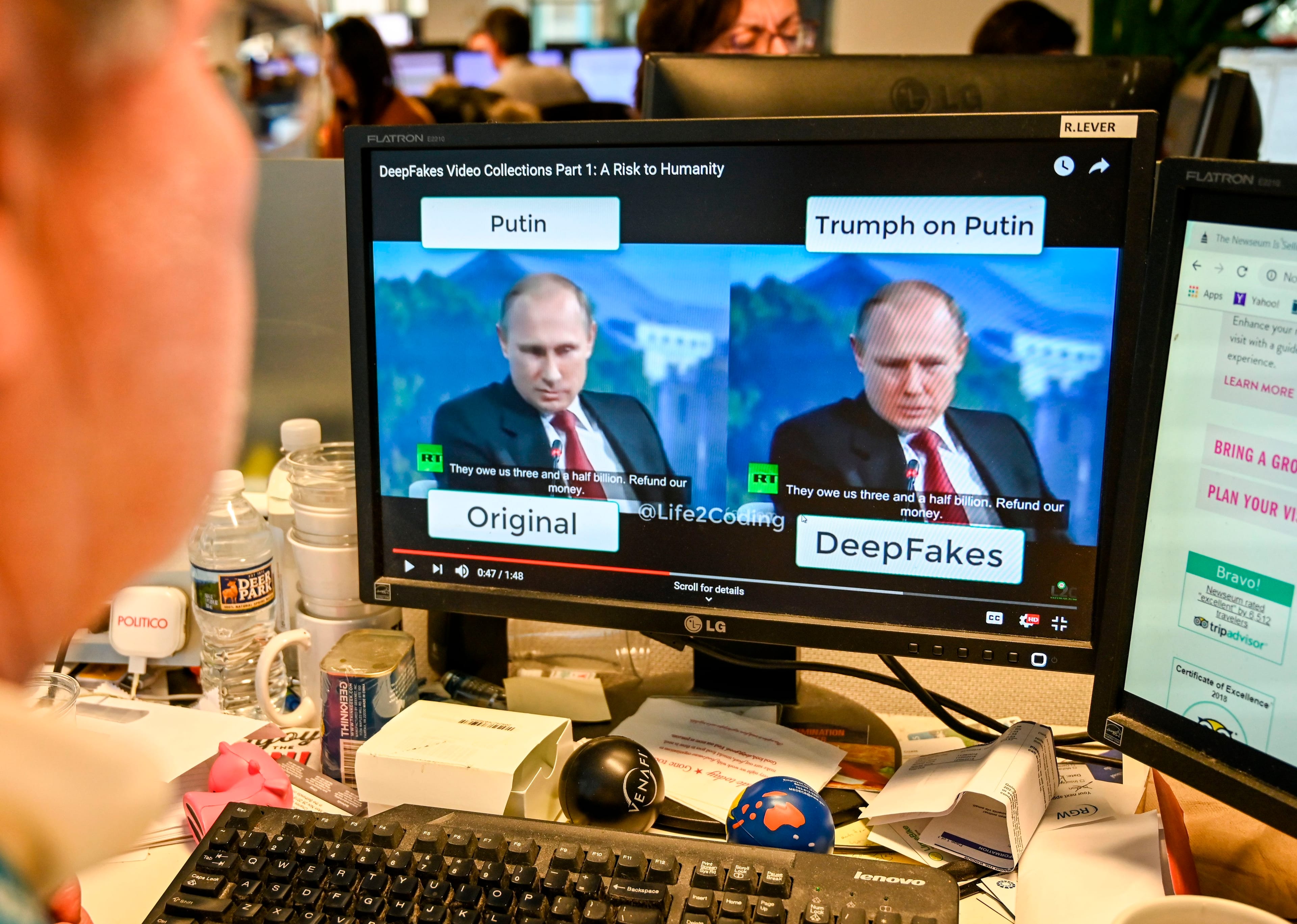 An AFP journalist views a video on Jan. 25, 2019, manipulated with artificial intelligence to potentially deceive viewers, or "deepfake" at his newsdesk in Washington, DC. (ALEXANDRA ROBINSON/AFP/Getty Images)
