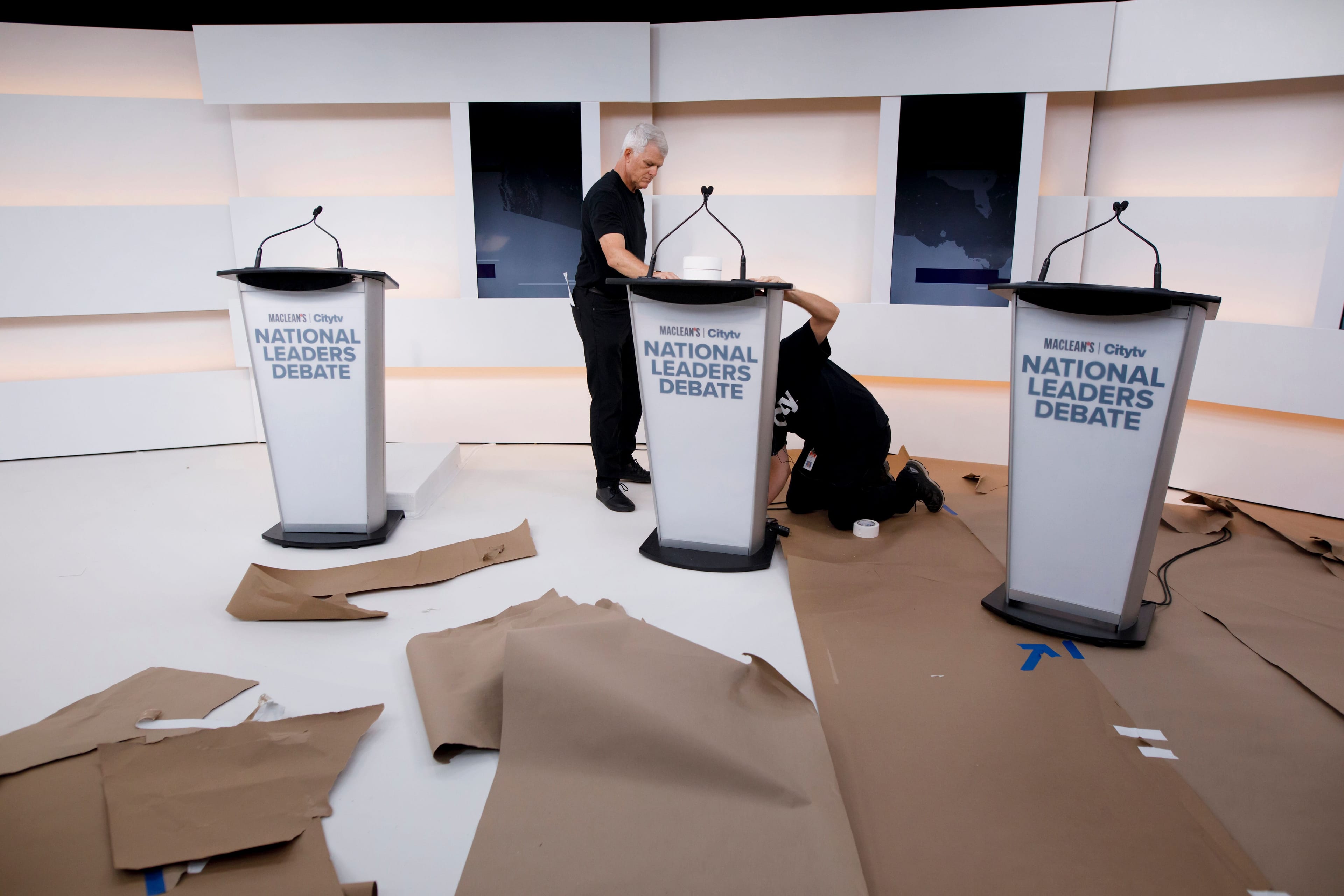 Final touches ahead of the Maclean’s and Citytv Federal Leaders Debate in Toronto, featuring Elizabeth May, Jagmeet Singh, and Andrew Scheer, moderated by Paul Wells. (Photograph by Cole Burston)