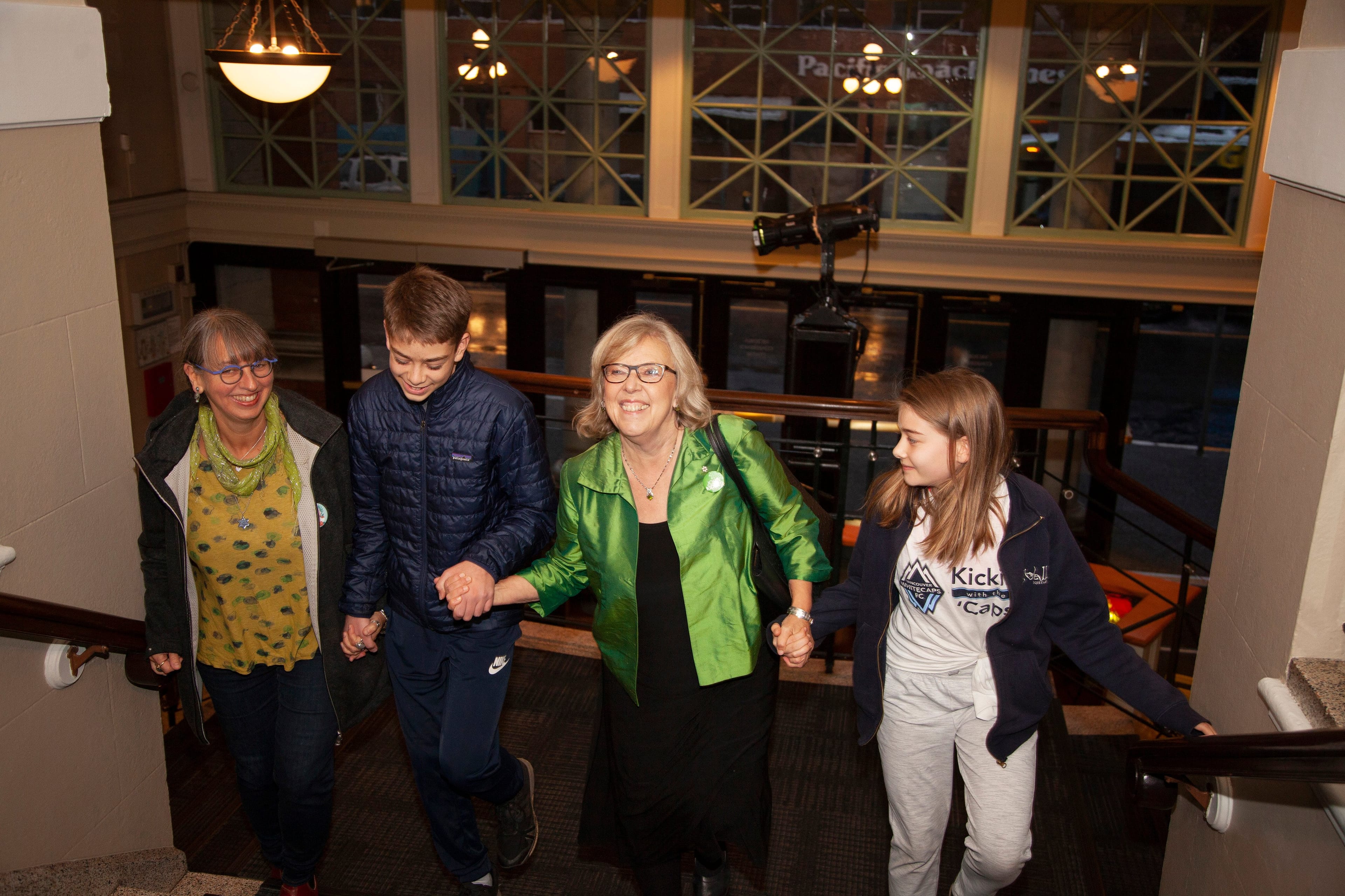 May enters Crystal Garden with family. (Photograph by Jen Osborne)
