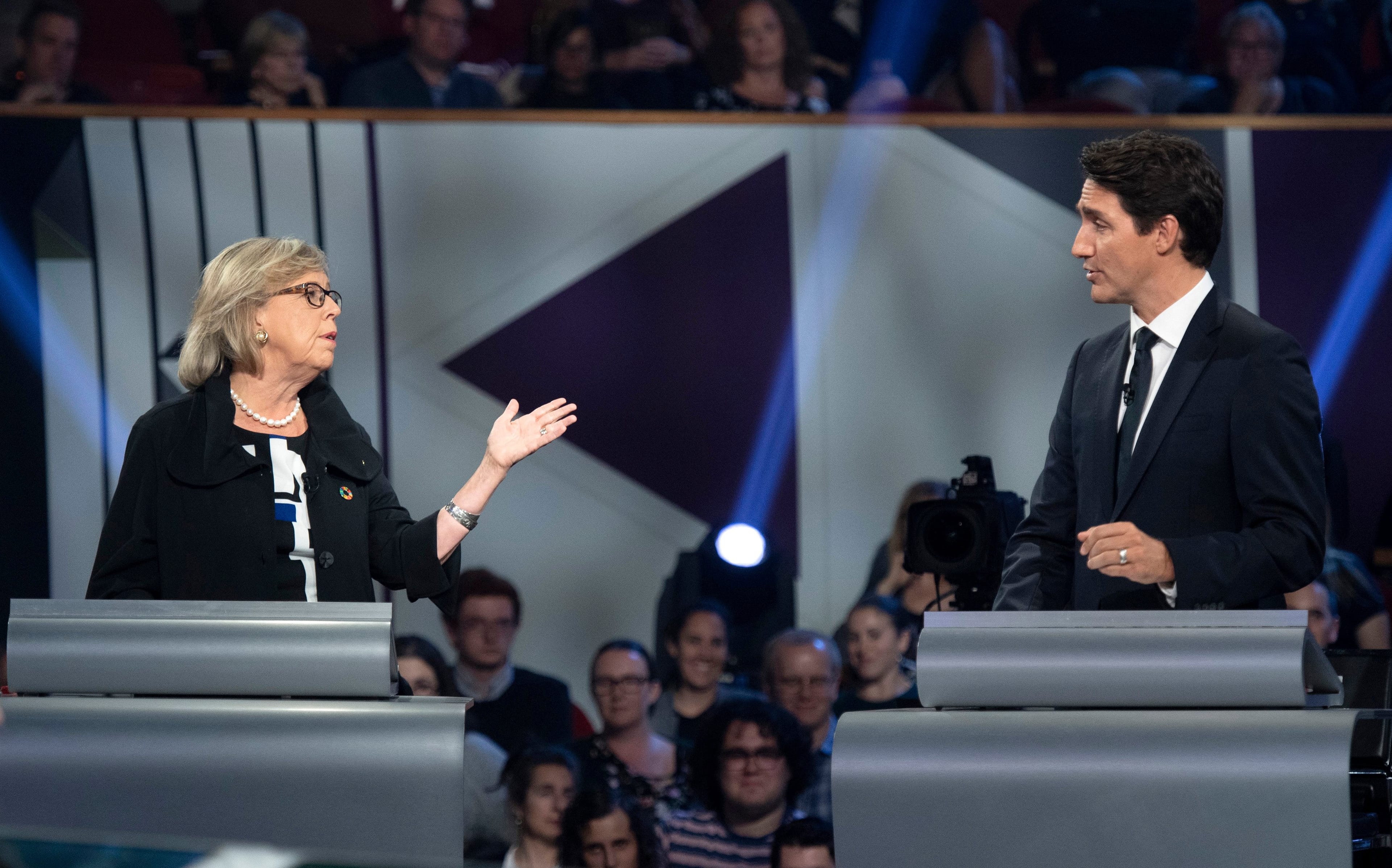 May and Trudeau at the Federal Leaders Debate on Oct. 7, 2019 (Justin Tang/CP)