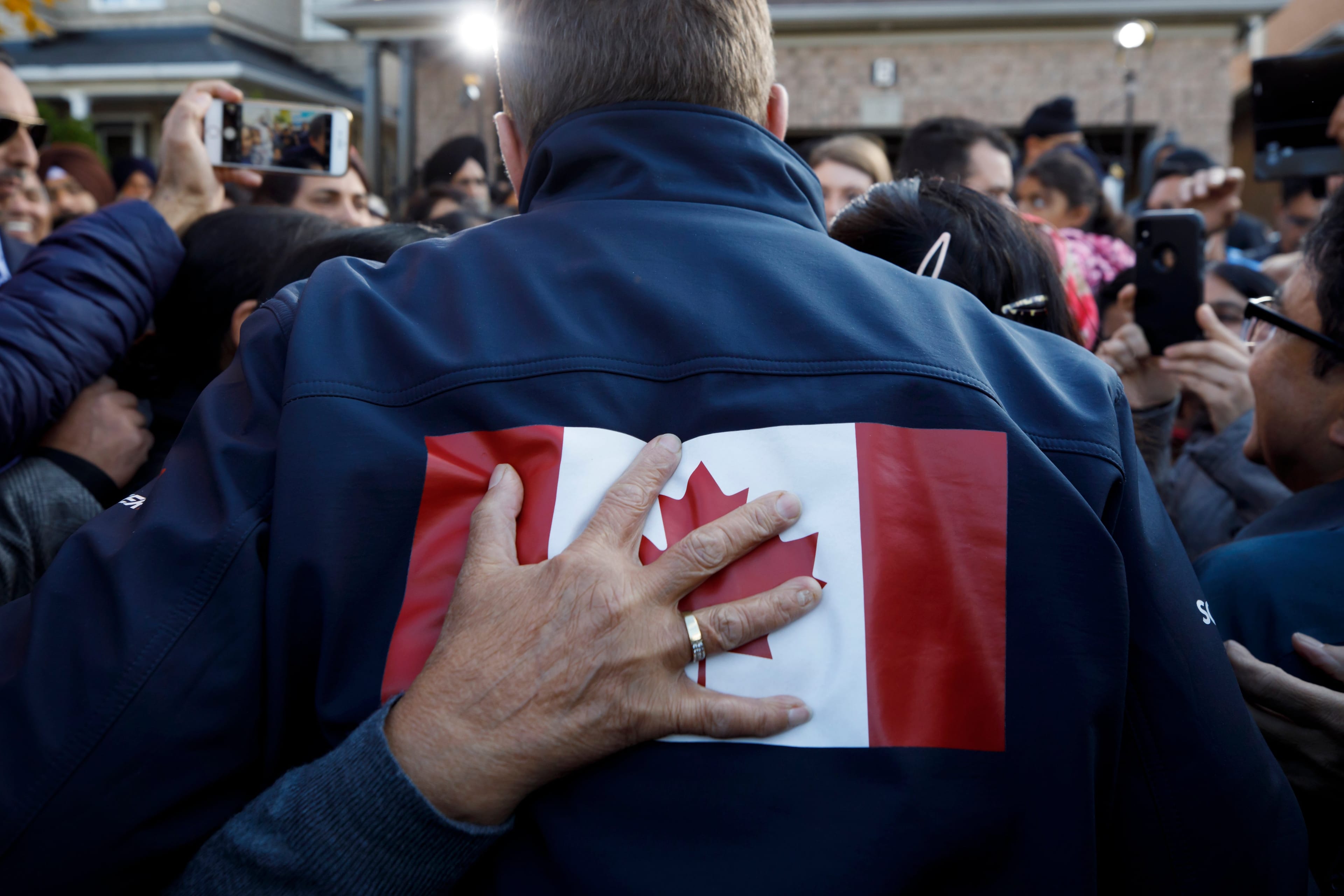 Scheer takes photos with supporters during a campaign stop on Oct. 19, 2019, in Brampton, Ont. (Cole Burston/Getty Images)